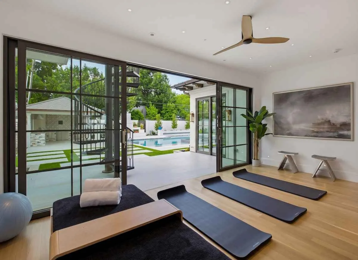 Wellness room with ensuite bathroom and patio