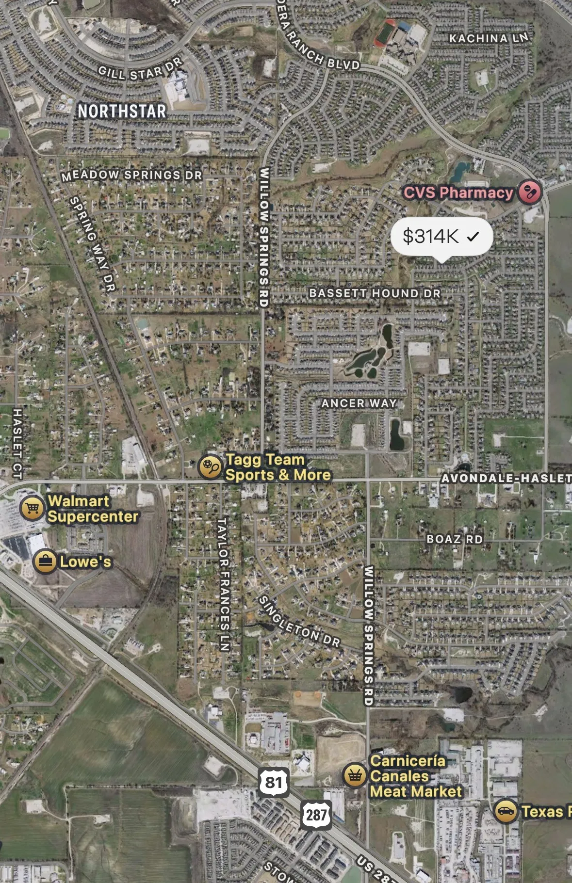 Map. Displaying an aerial view of a property with surrounding roads, businesses, and a price indicator