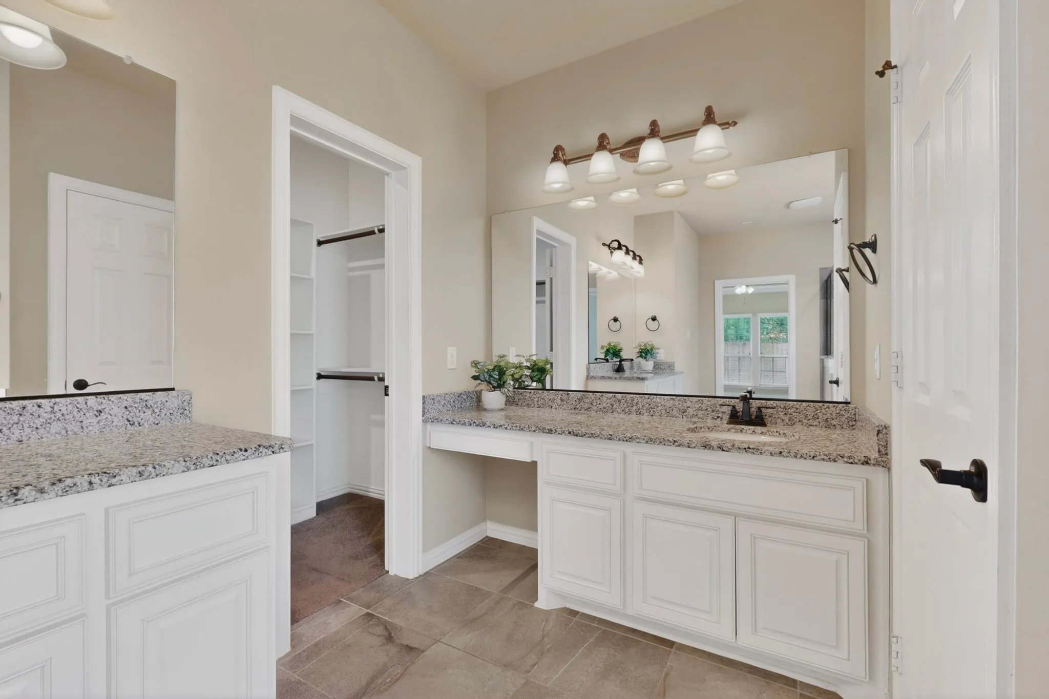 MASTER ENSUITE WITH SEPARATE HIS AND HERS VANITIES