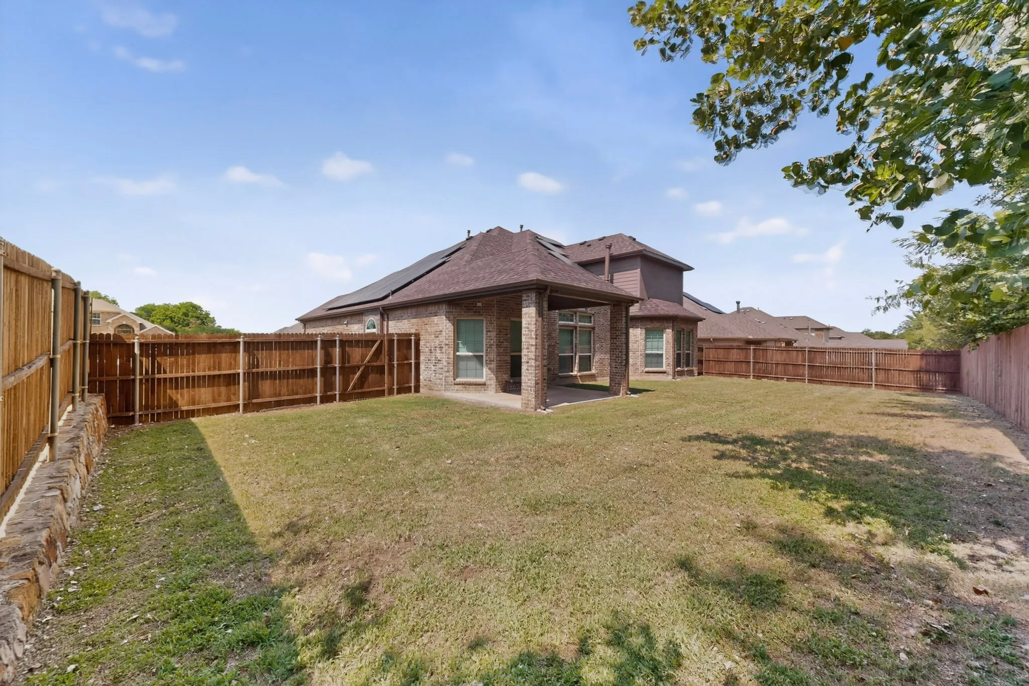 BACKYARD HAS ENOUGH SPACE FOR THE KIDS TO RUN AND PLAY...SPACE FOR A BIG TEXAS SIZE BARBEQUE WITH FAMILY AND FRIENDS...!!!