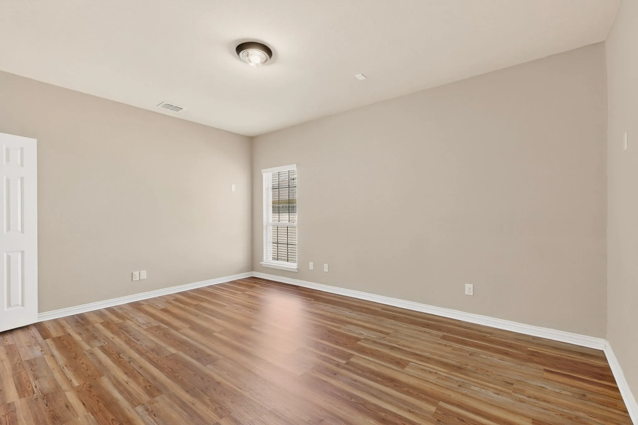 THIS IS THE 1ST FLOOR MEDIA ROOM WITH SHELVES WITH NICE WOOD FLOORS...!!!