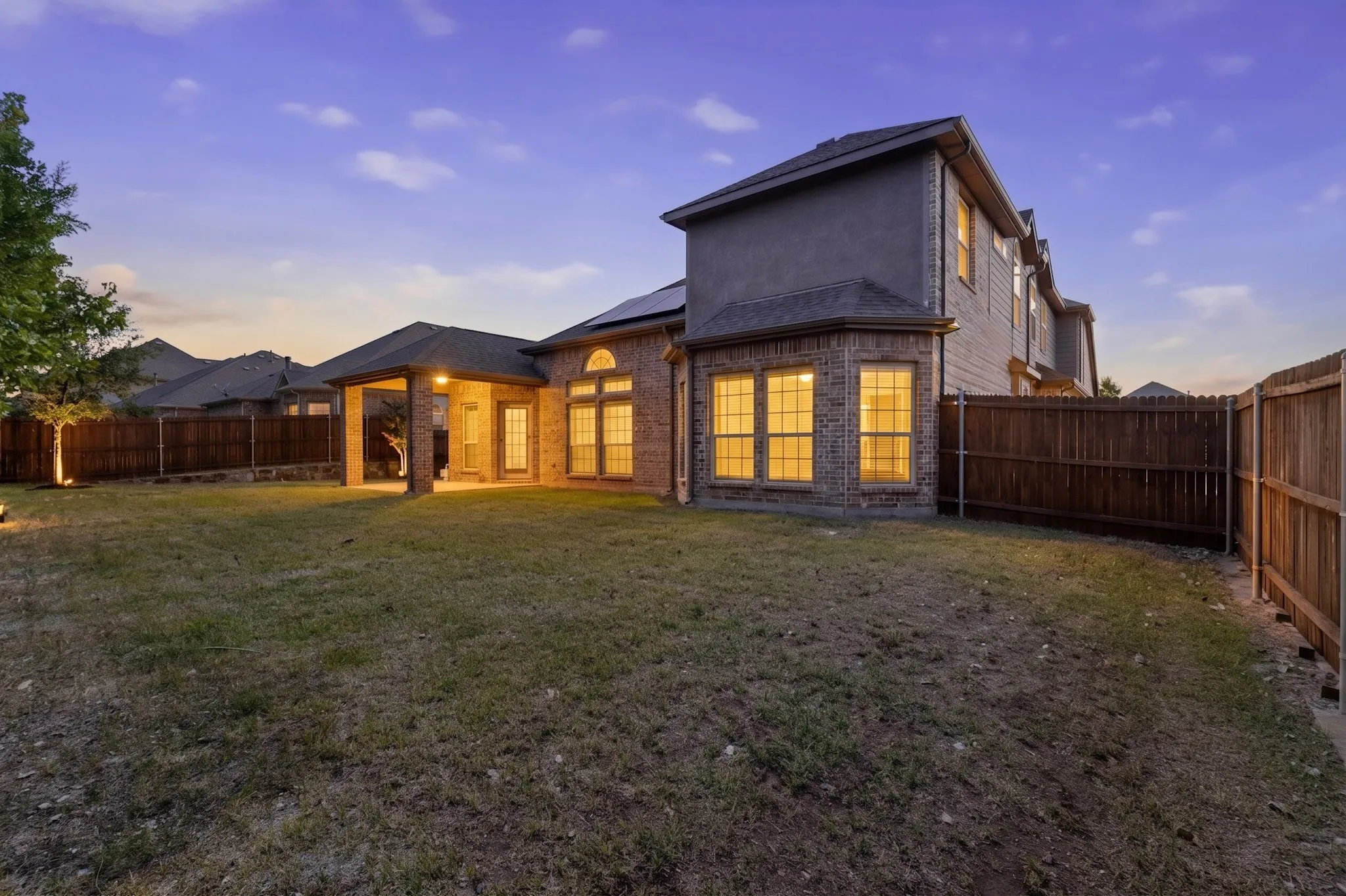 THE LARGE BACKYARD HAS COVERED PATIO AND IS BEAUTIFUL AT NIGHT ALSO...!!!