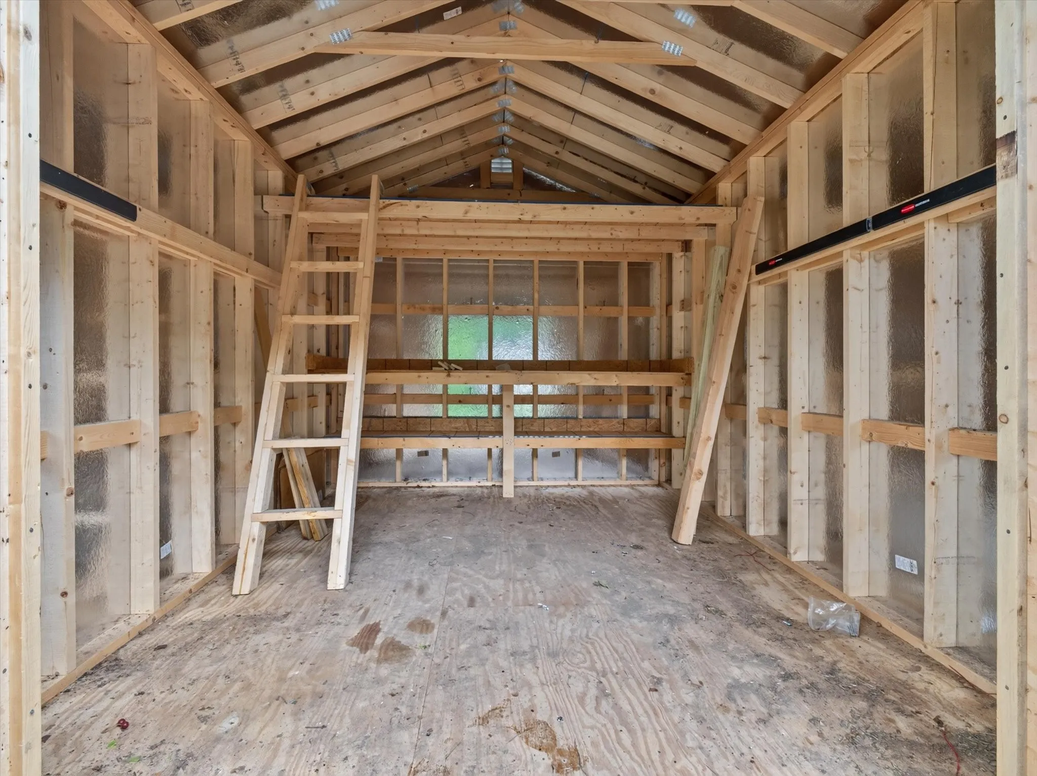 10x12 insulated storage shop with loft in backyard