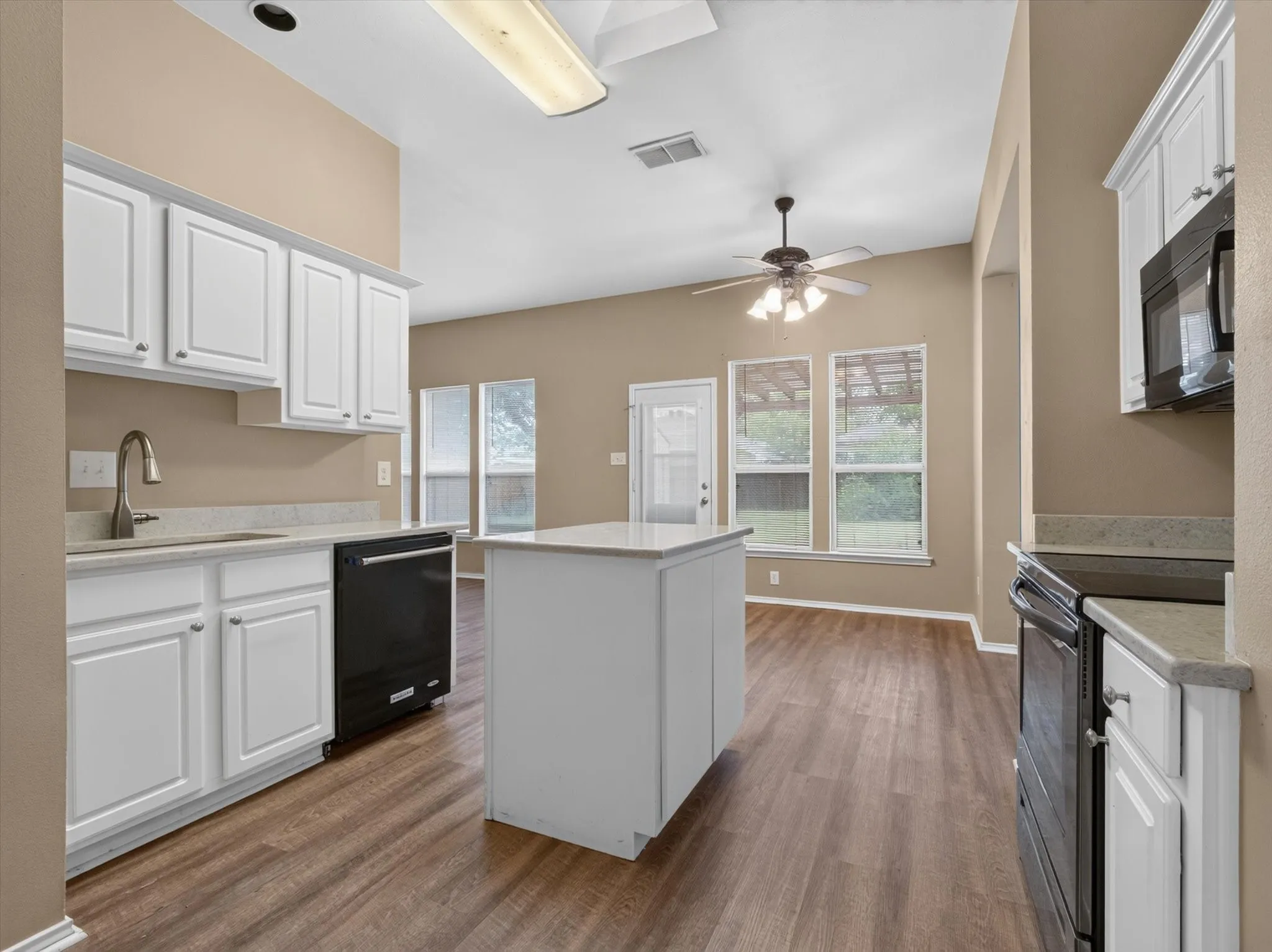 Updated Kitchen with granite countertops and island