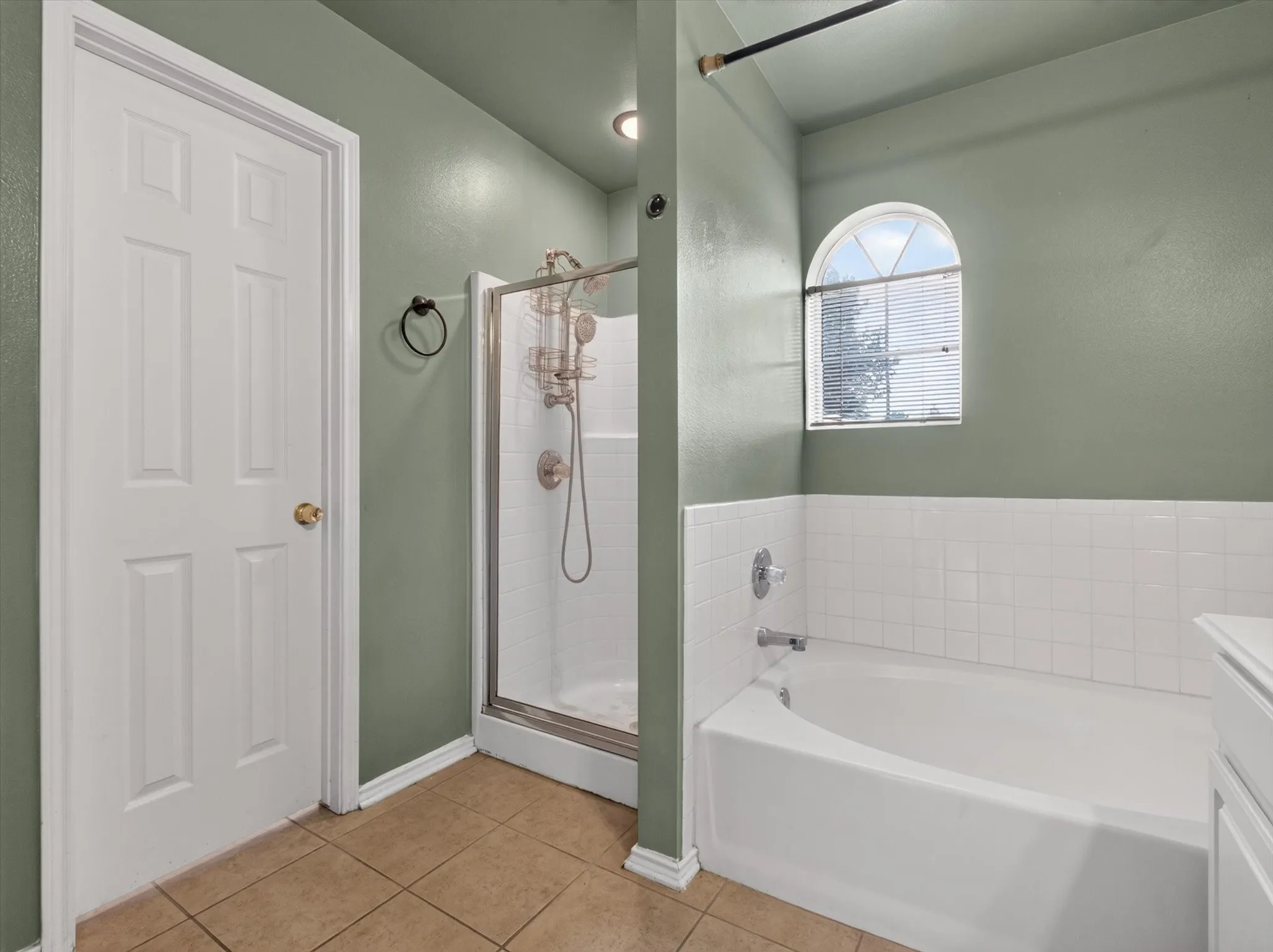 Primary Bathroom with Dual Sinks, Garden Tub, and Walk In shower