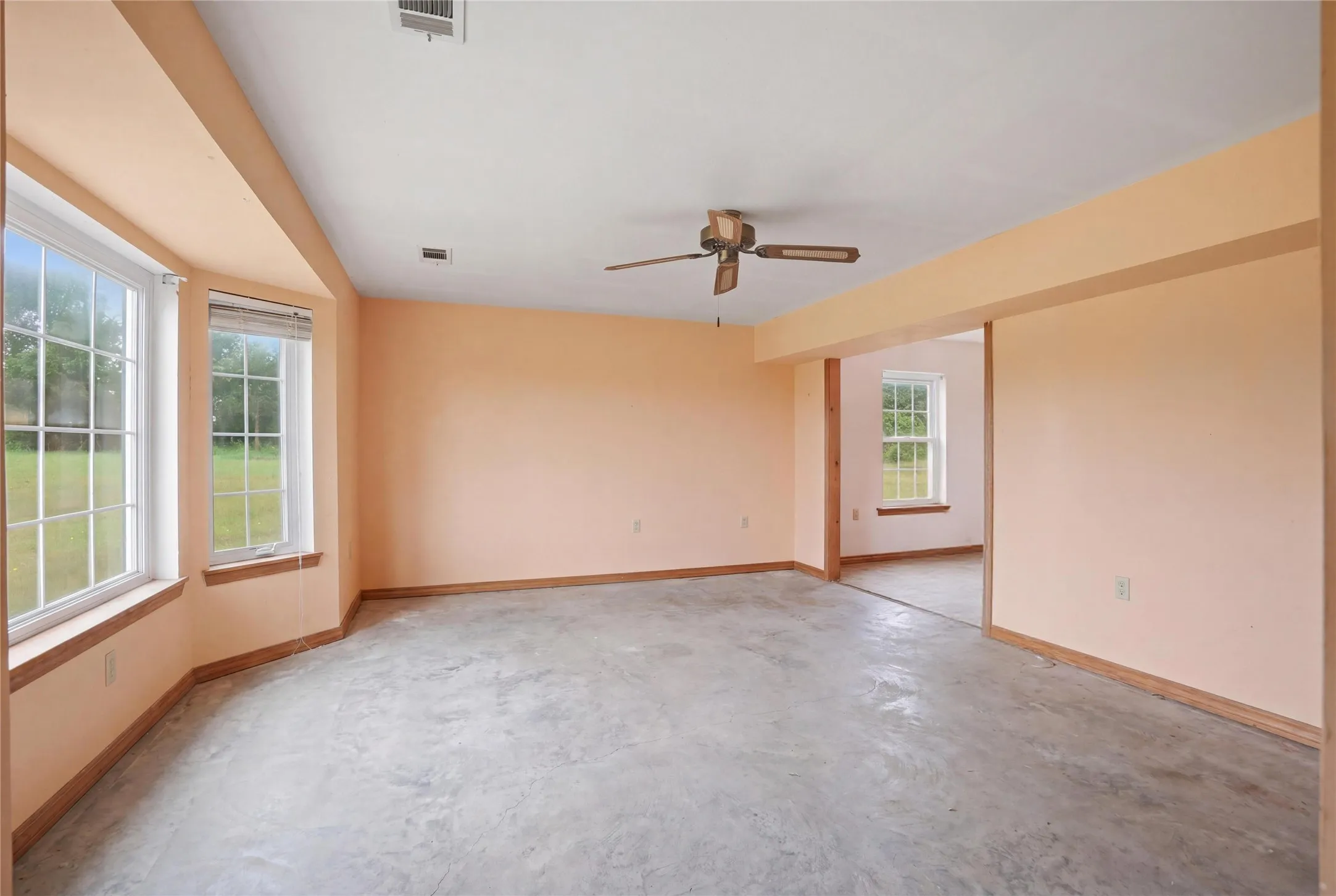 Spacious interior with oversized windows, open flow, and a bright airy atmosphere ready for your personal touch