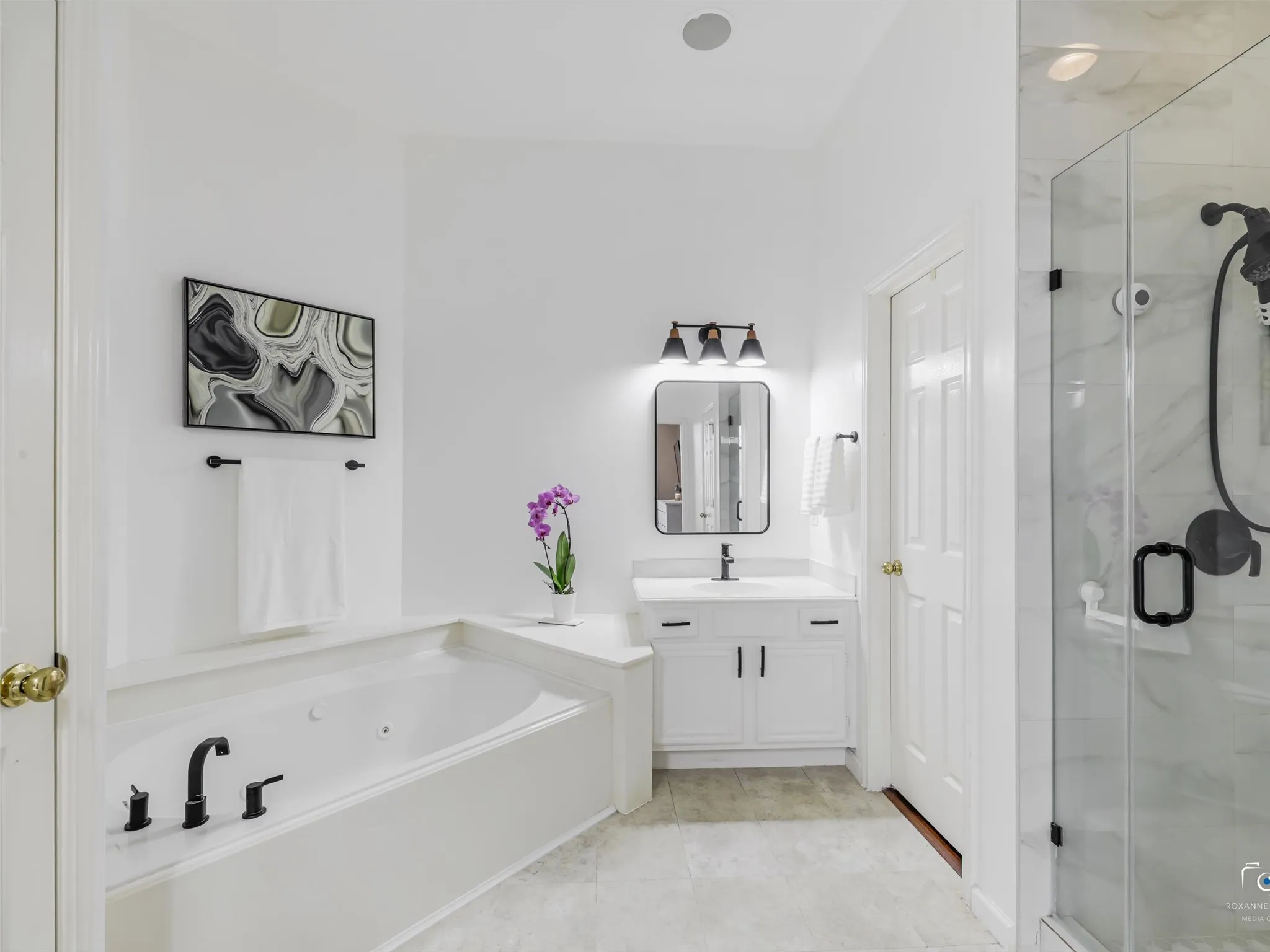 Check out this clean and crisp master bath. Perfect for relaxation at the end of the day!