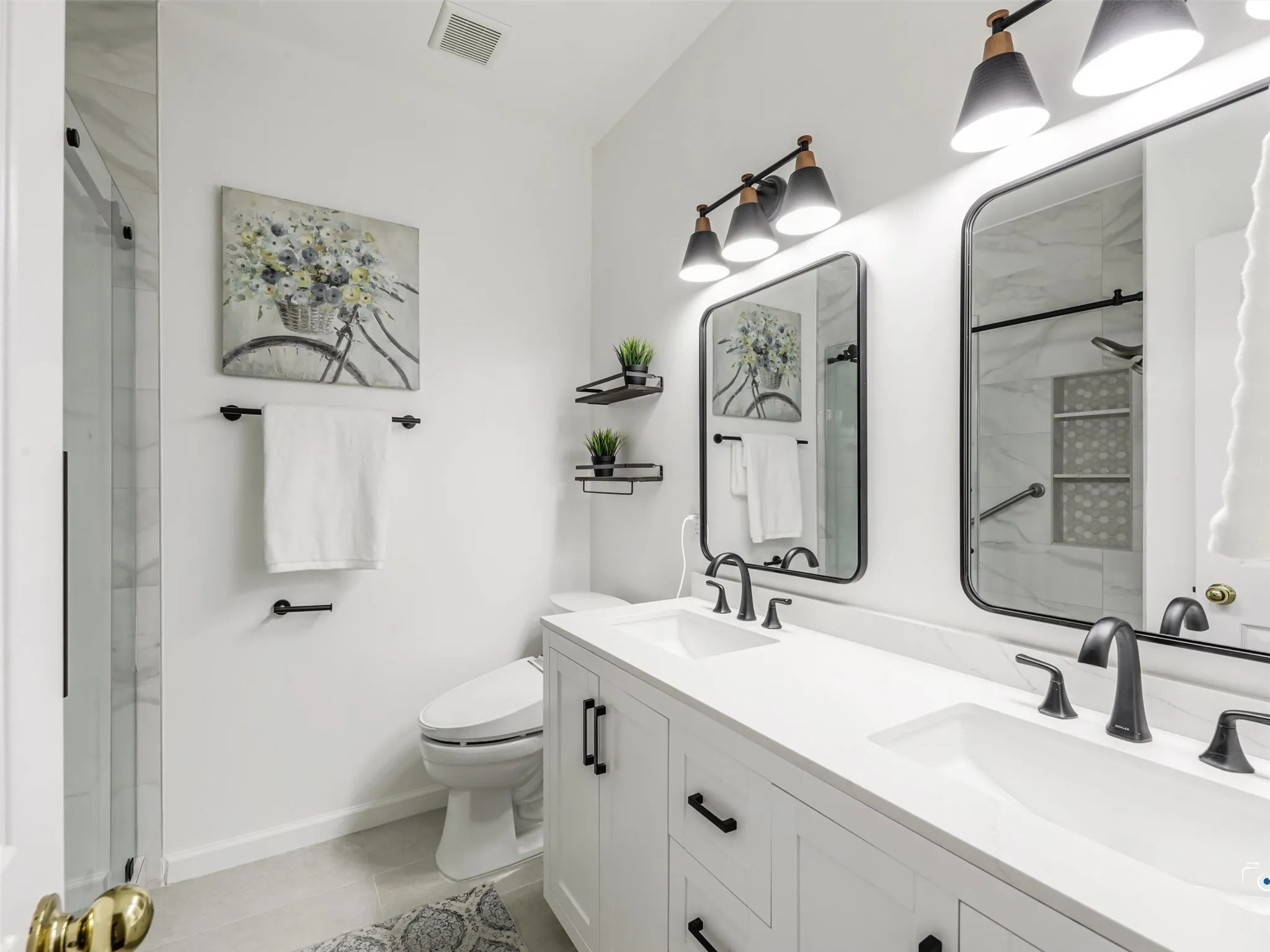 Secondary bathroom has been beautifully renovated.