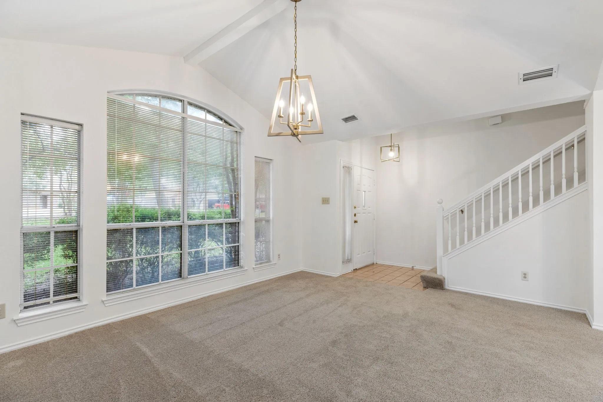 Updated flooring, paint, removed popcorn ceiling.