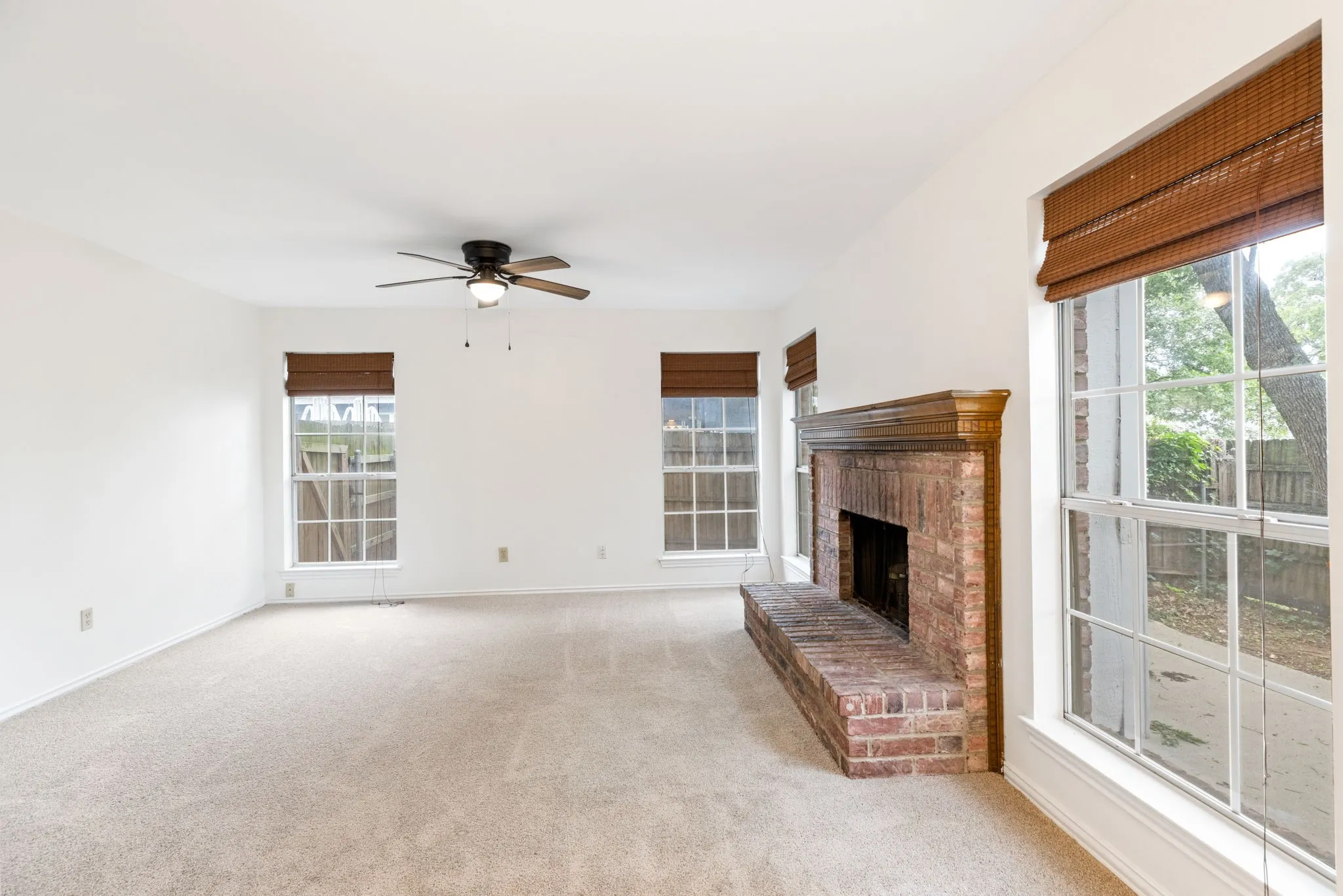 Large living room with fireplace.