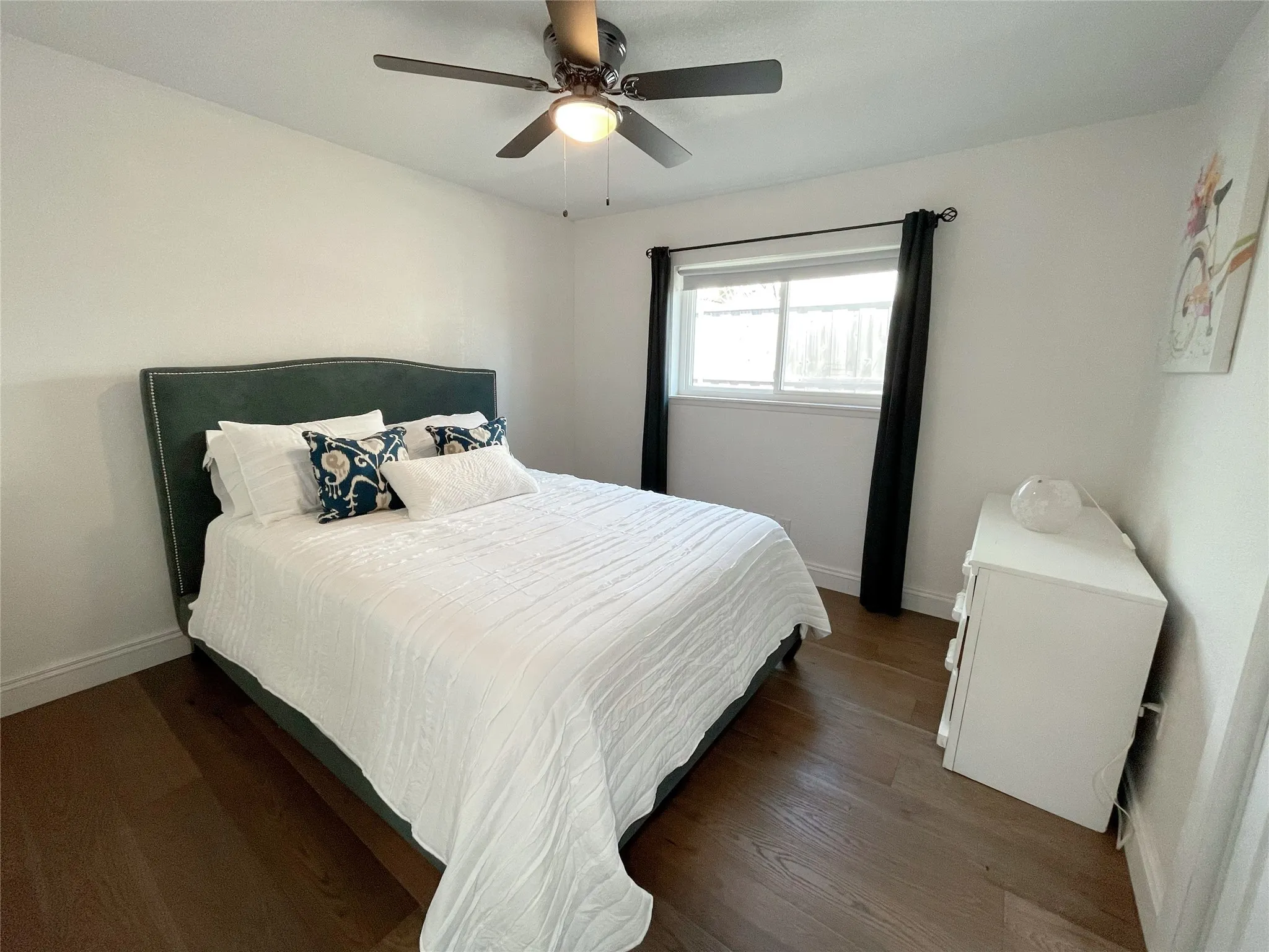Interior room with wood-finish flooring