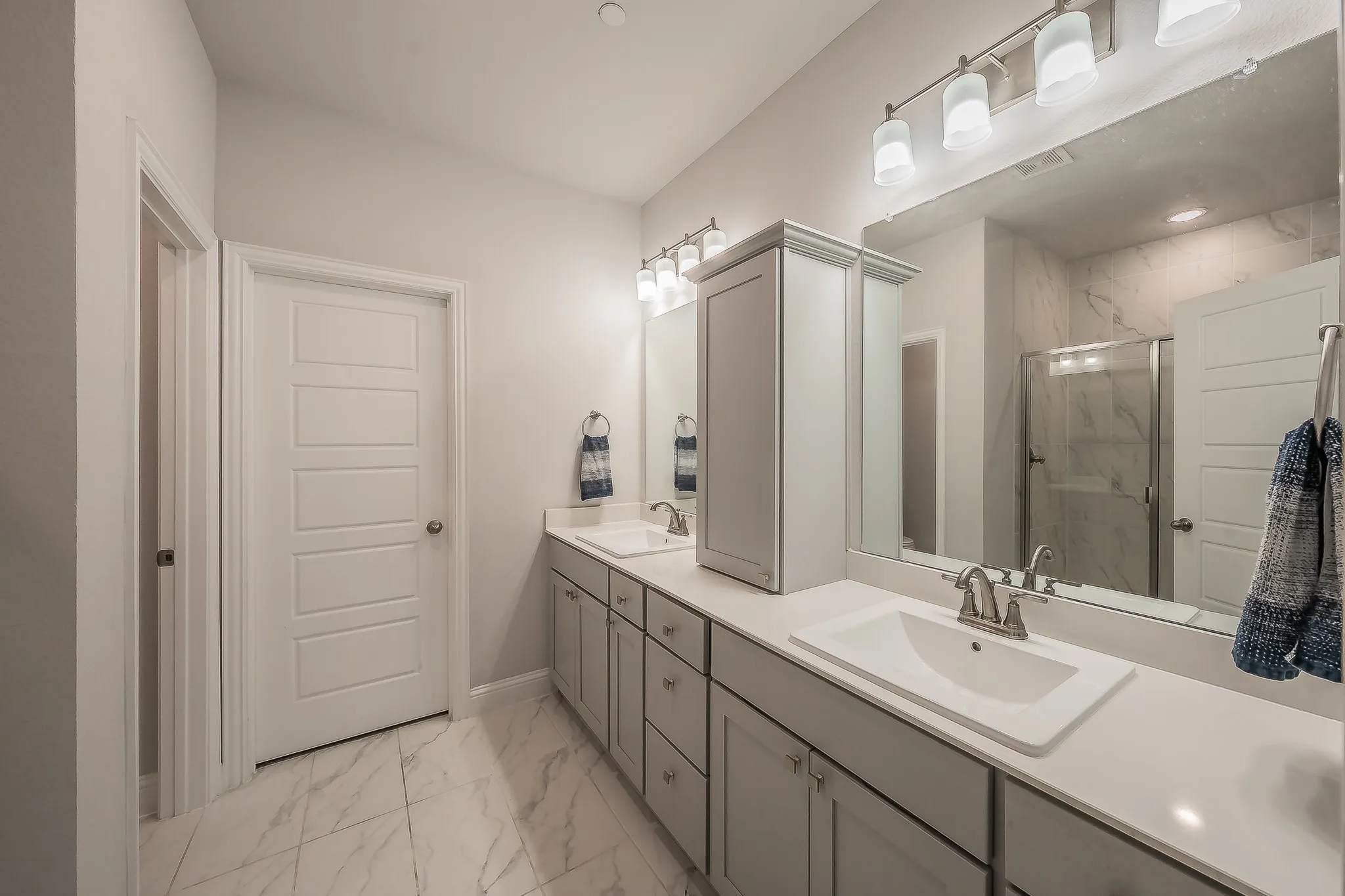 Double vanities and another closet!