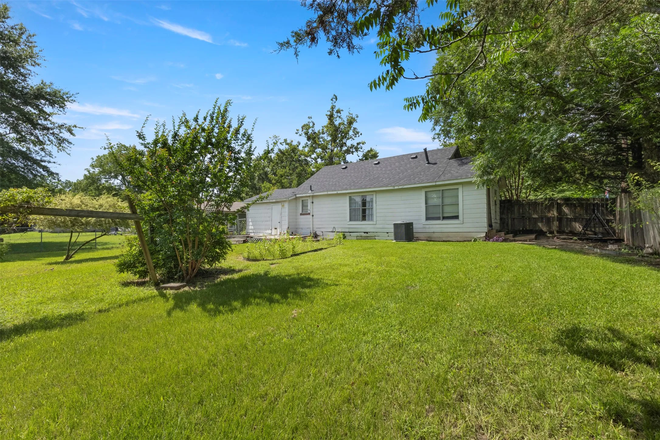 Spacious green lawn surrounding the property
