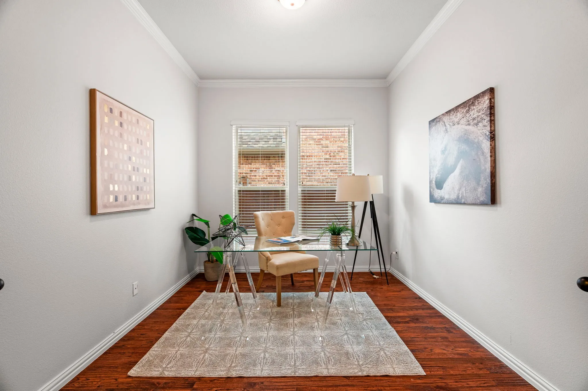 With warm hardwood floors underfoot and French doors that provide both privacy and style, this home office delivers the perfect balance of function and elegance.