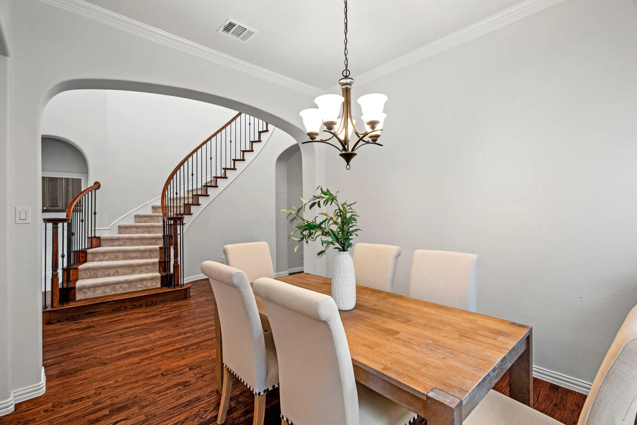 At the center of the home, a flexible space offers endless possibilities—perfect as a formal dining room, elegant sitting area, or second home office to suit your lifestyle needs.