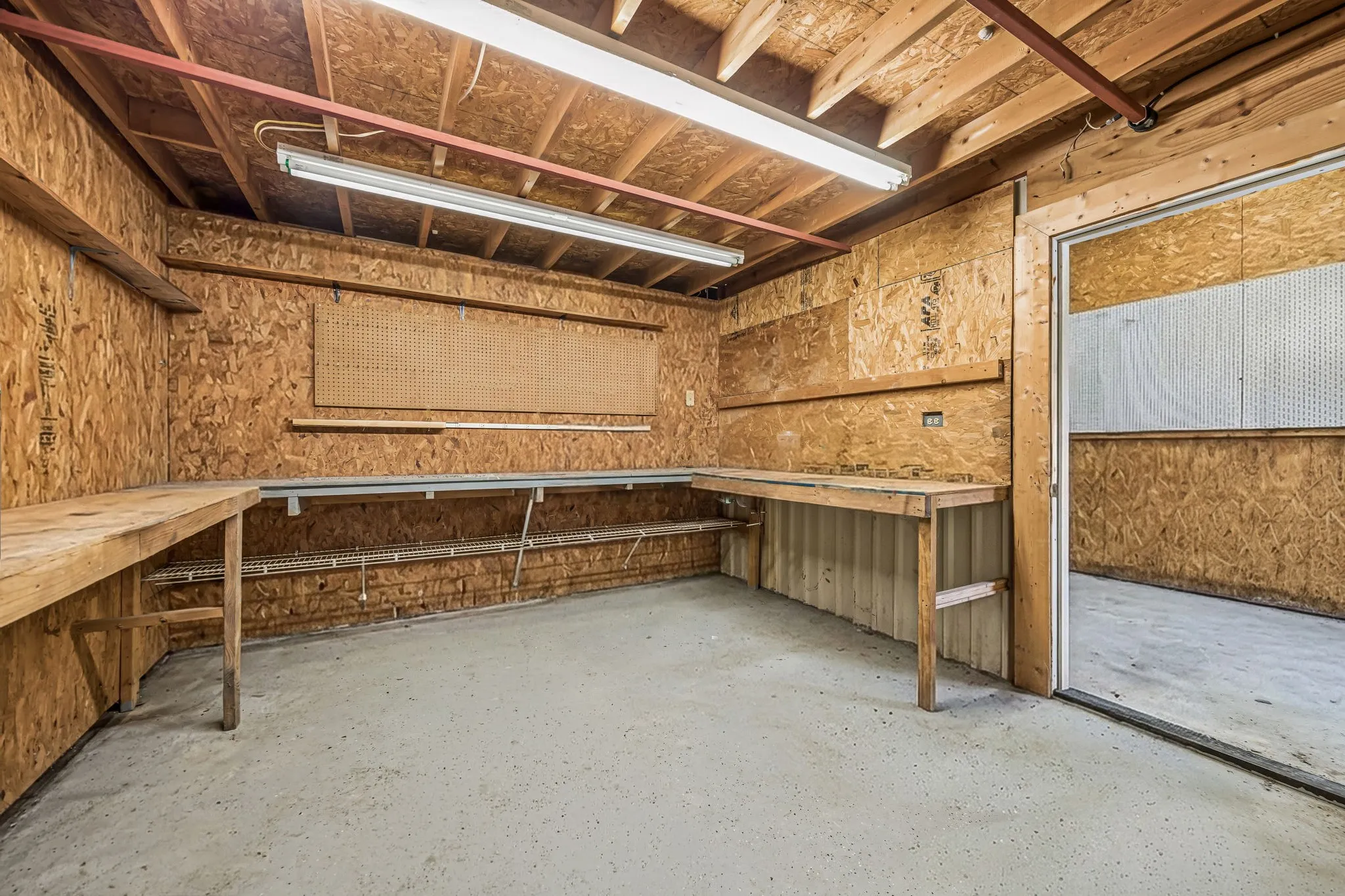 This space could serve as an office for a business run from the garage or a workroom.