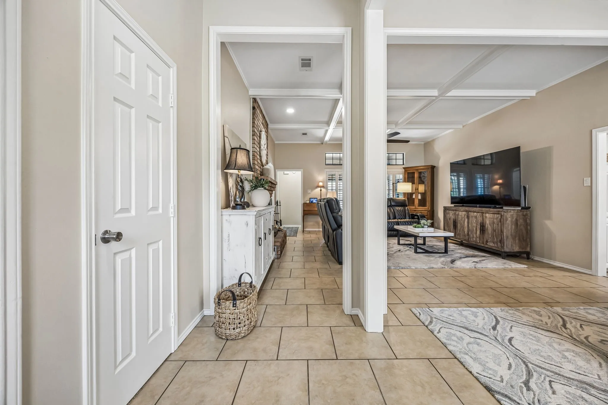 The entry opens to the stacked living and dining space. Easy care tile flooring runs thru the family areas of the home.