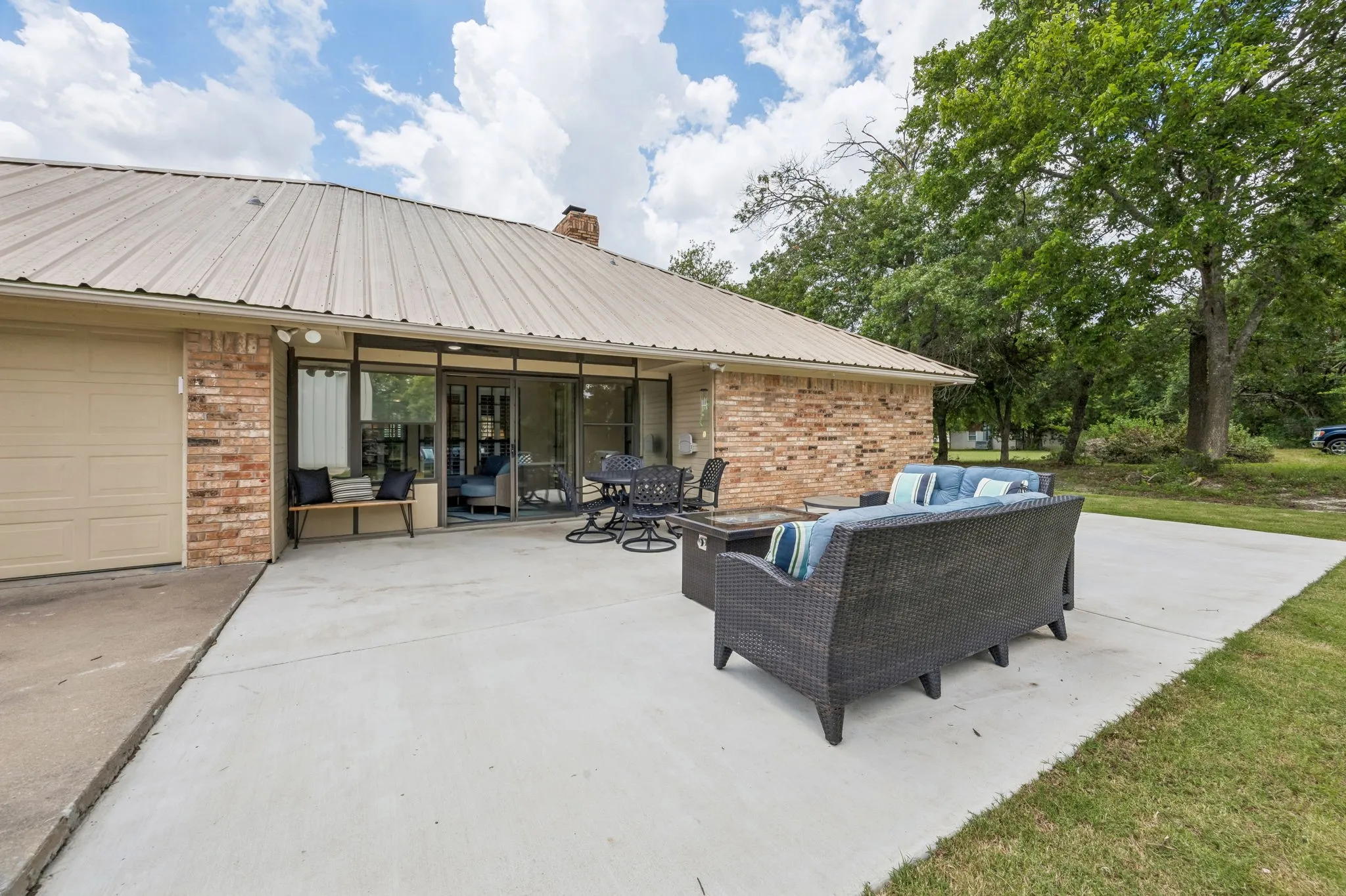 View of the patio and the back of the home.