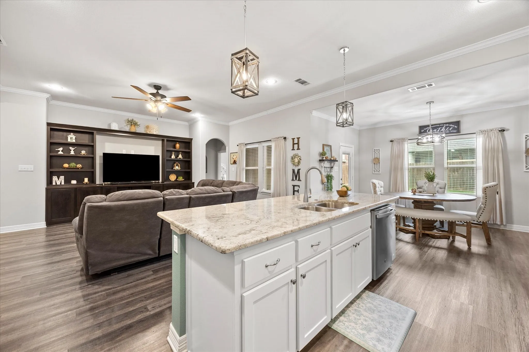 Kitchen opens onto family room and dining area