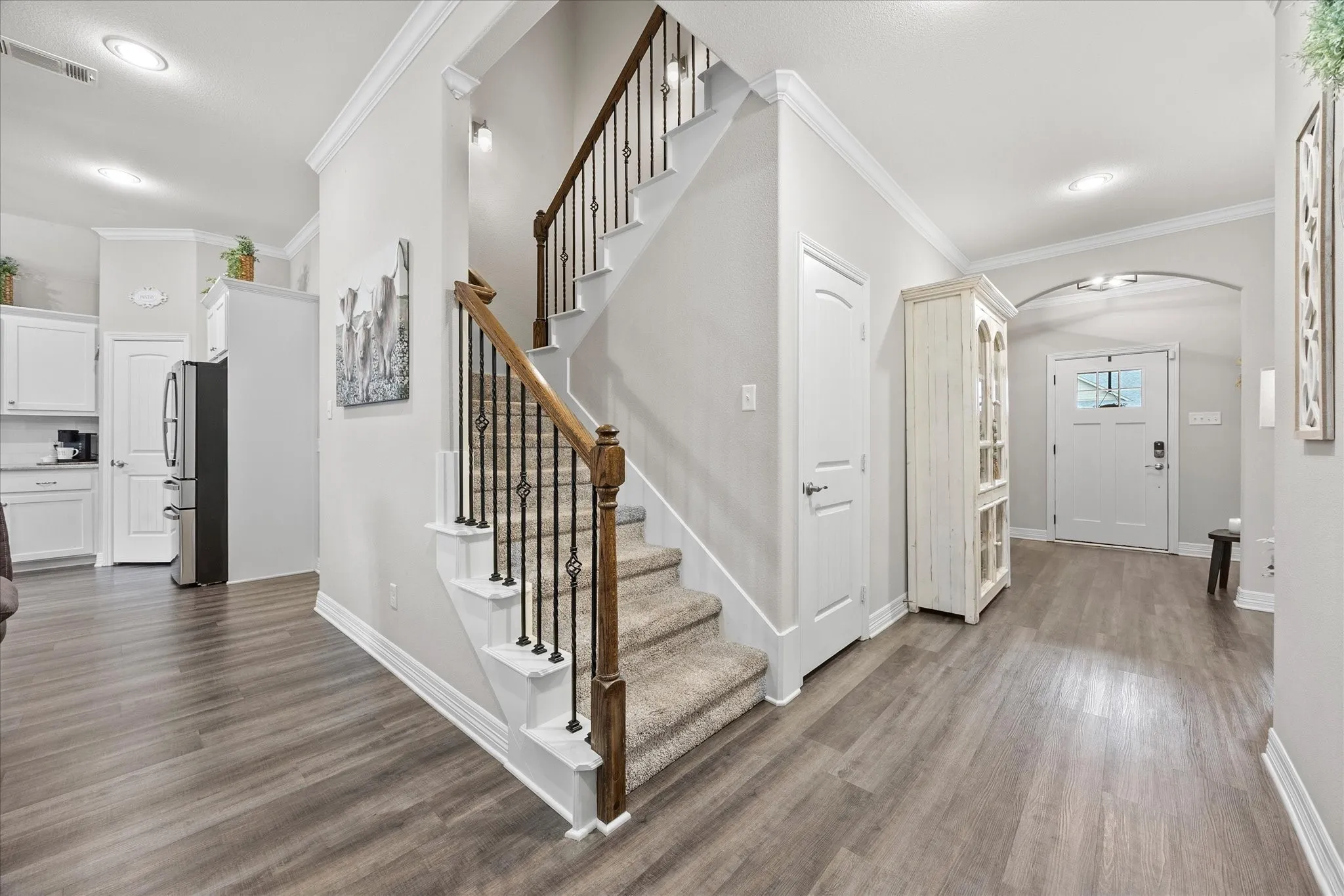 Grand foyer includes majestic staircase