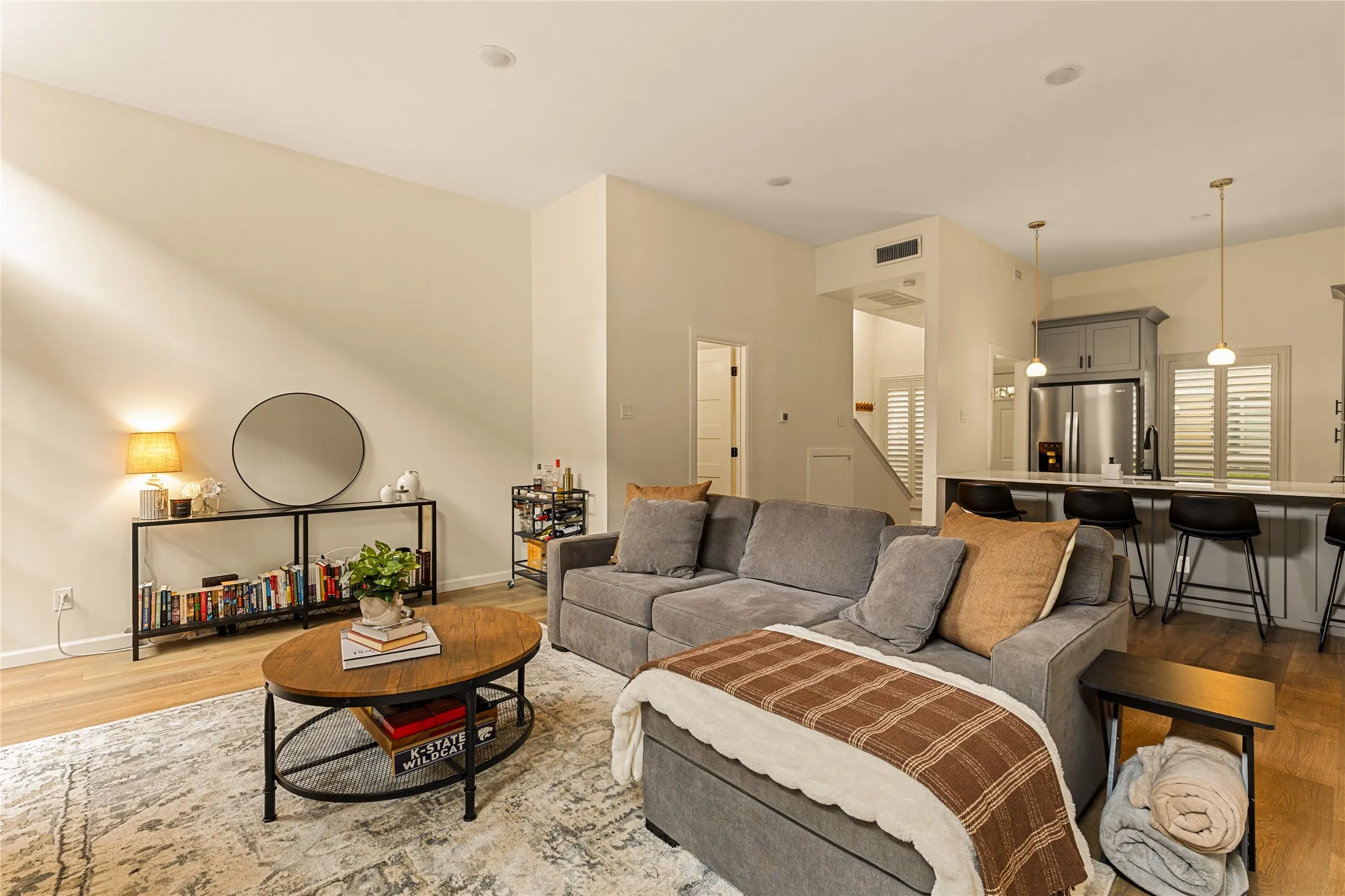 Warm wood tones paired with clean modern finishes.