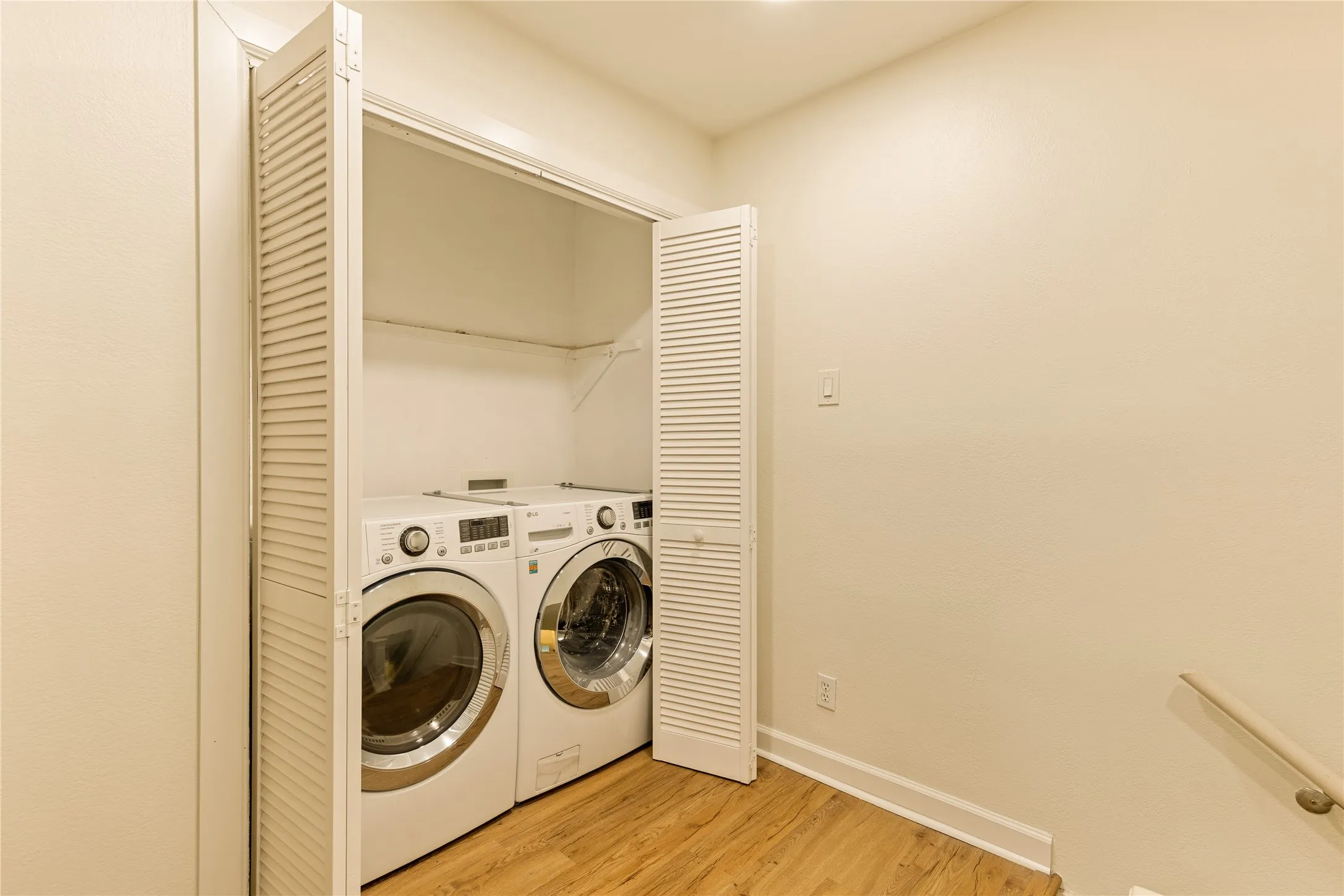Thoughtfully designed laundry area with added convenience.