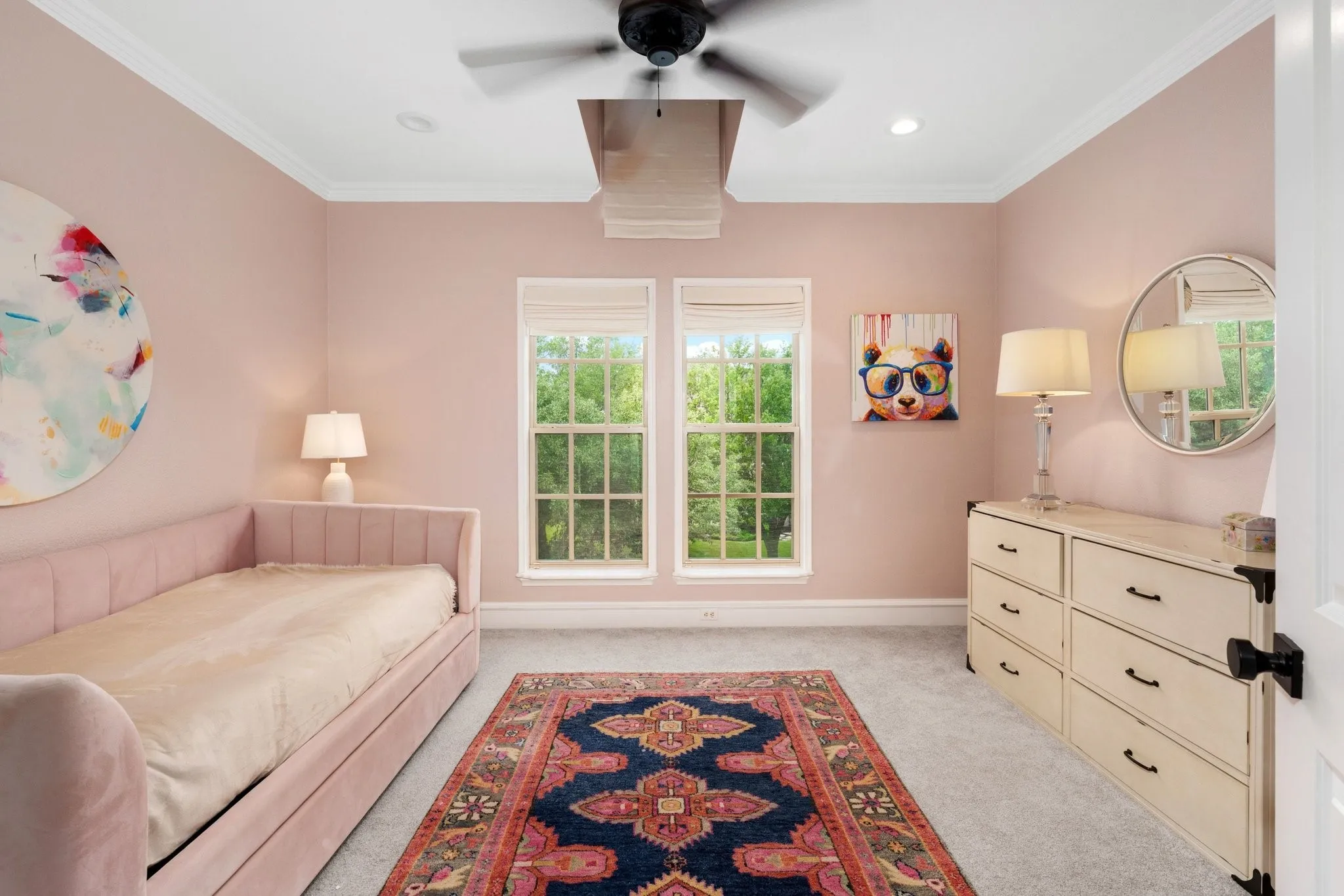 Interior space featuring two large windows, a ceiling fan, recessed lighting, and crown molding