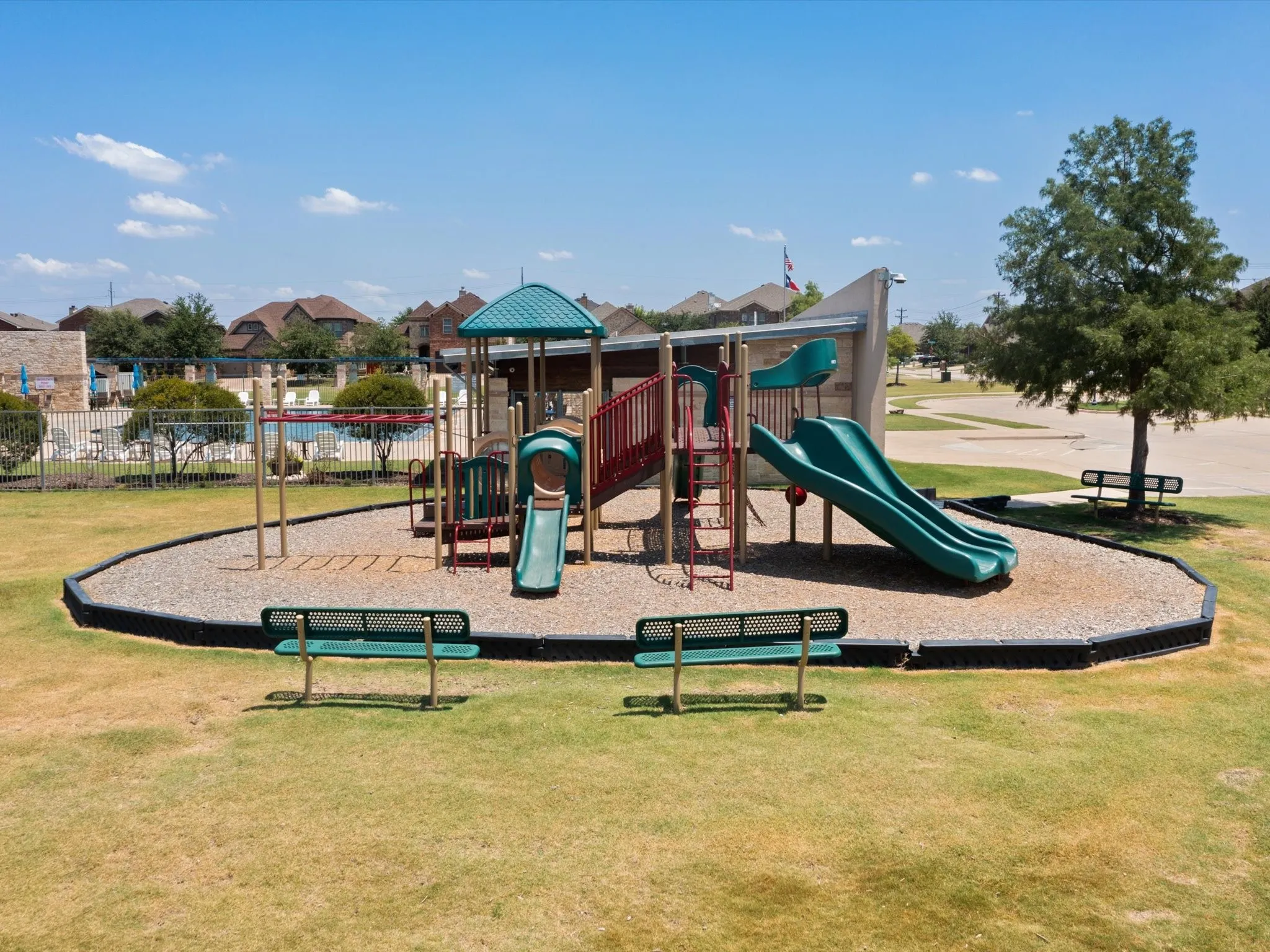 View of jungle gym with a yard