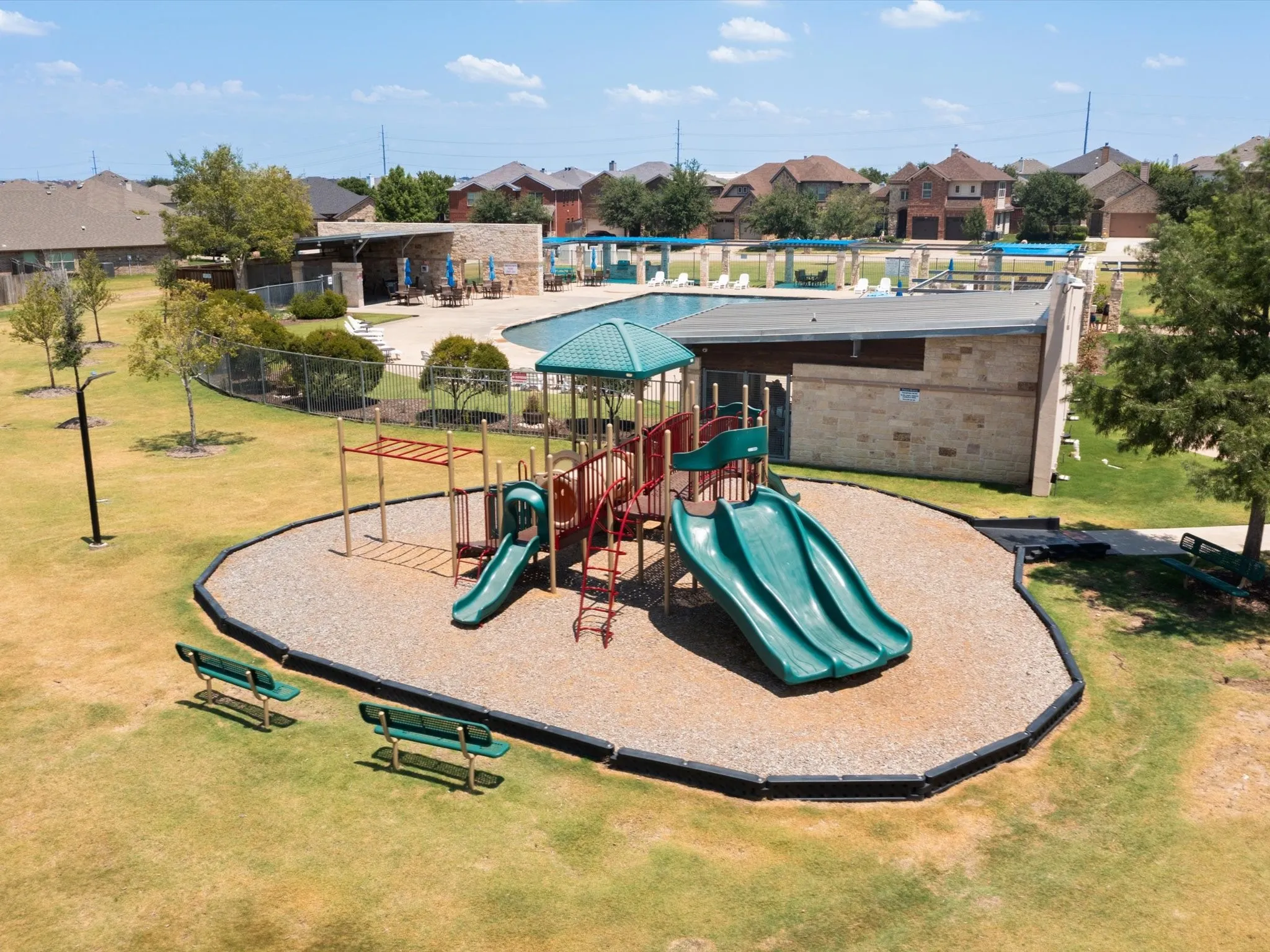 View of playground featuring a yard