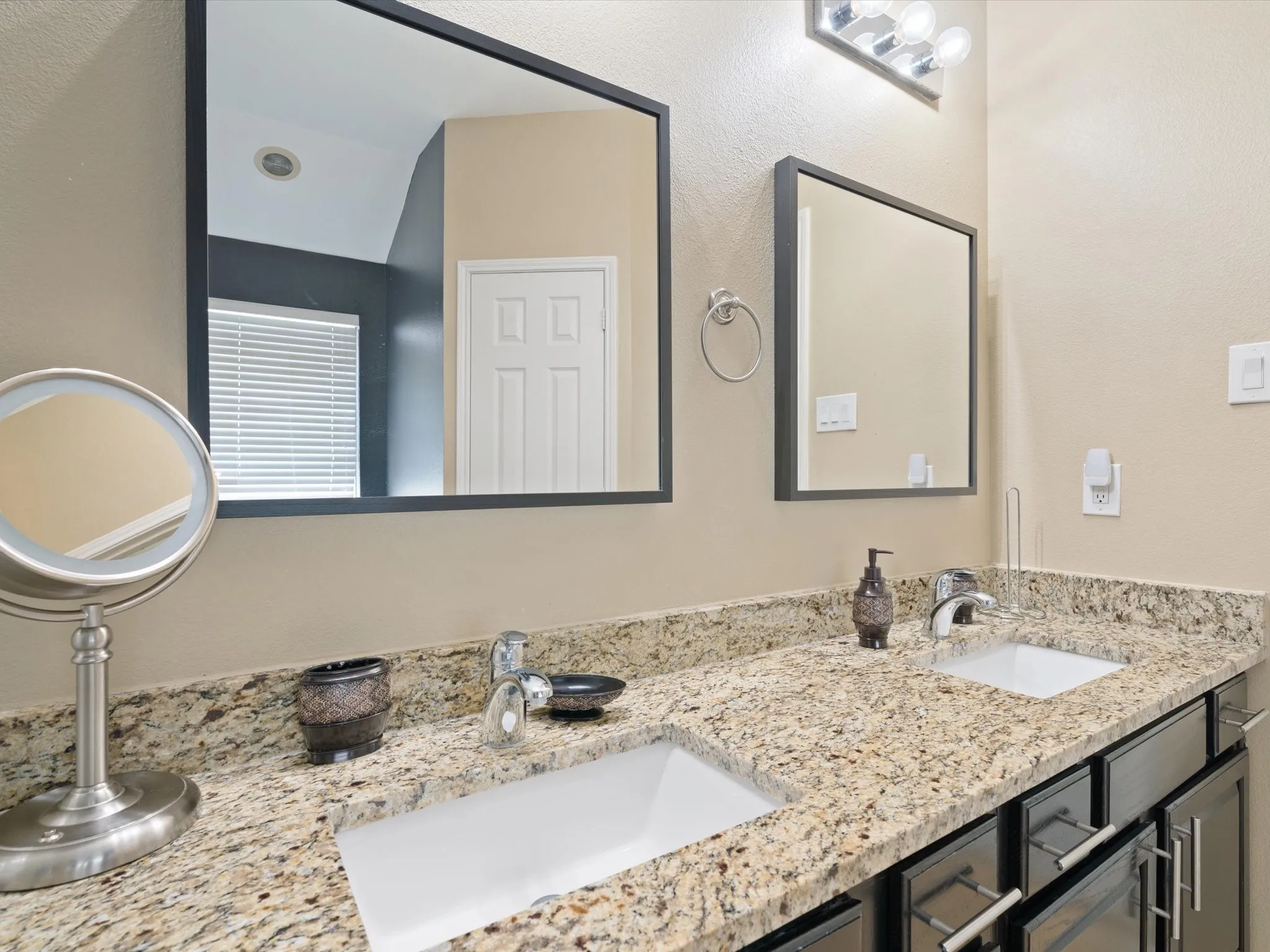 Bathroom featuring double vanity