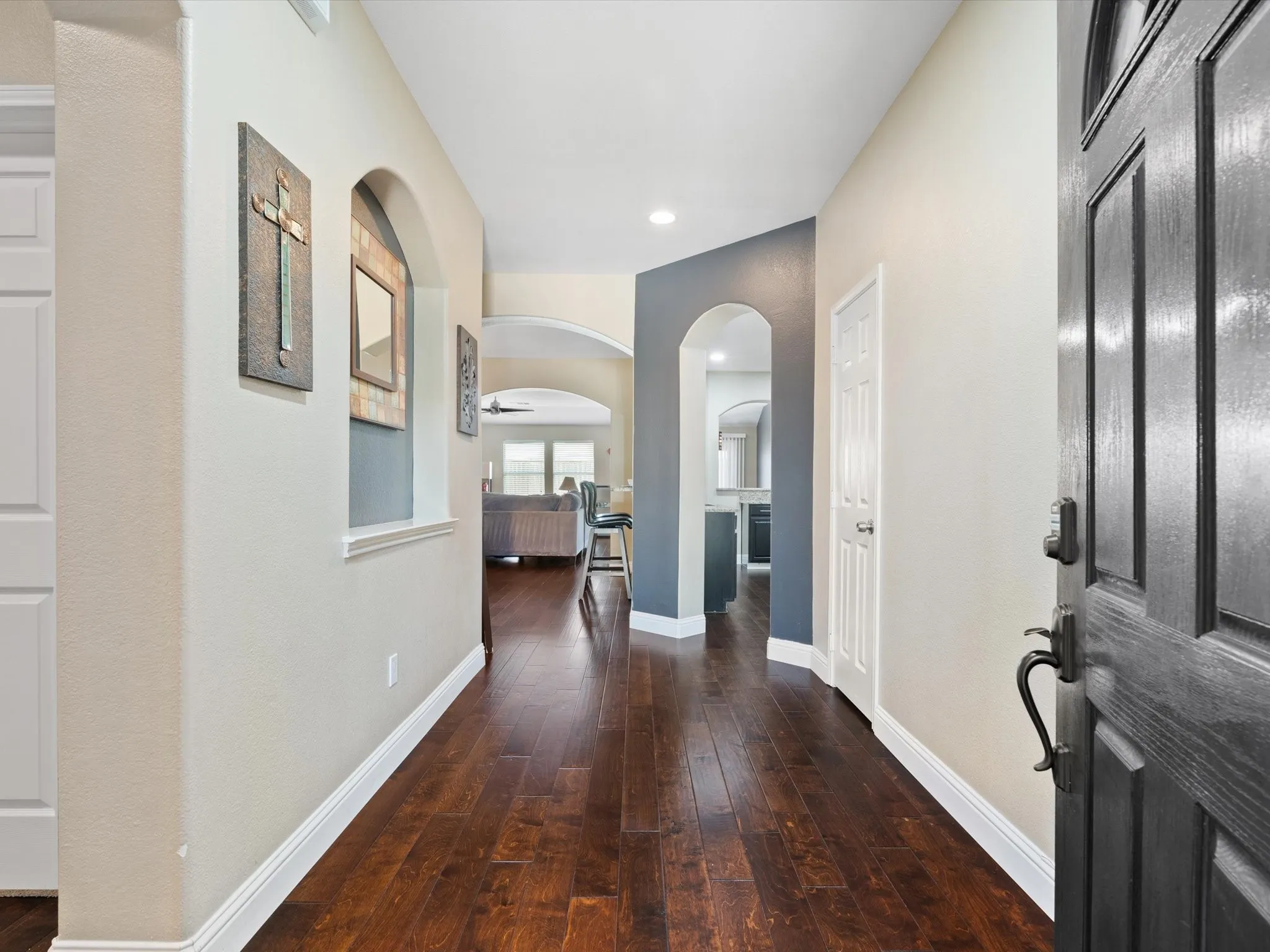 Entrance foyer featuring dark hardwood / wood-style flooring