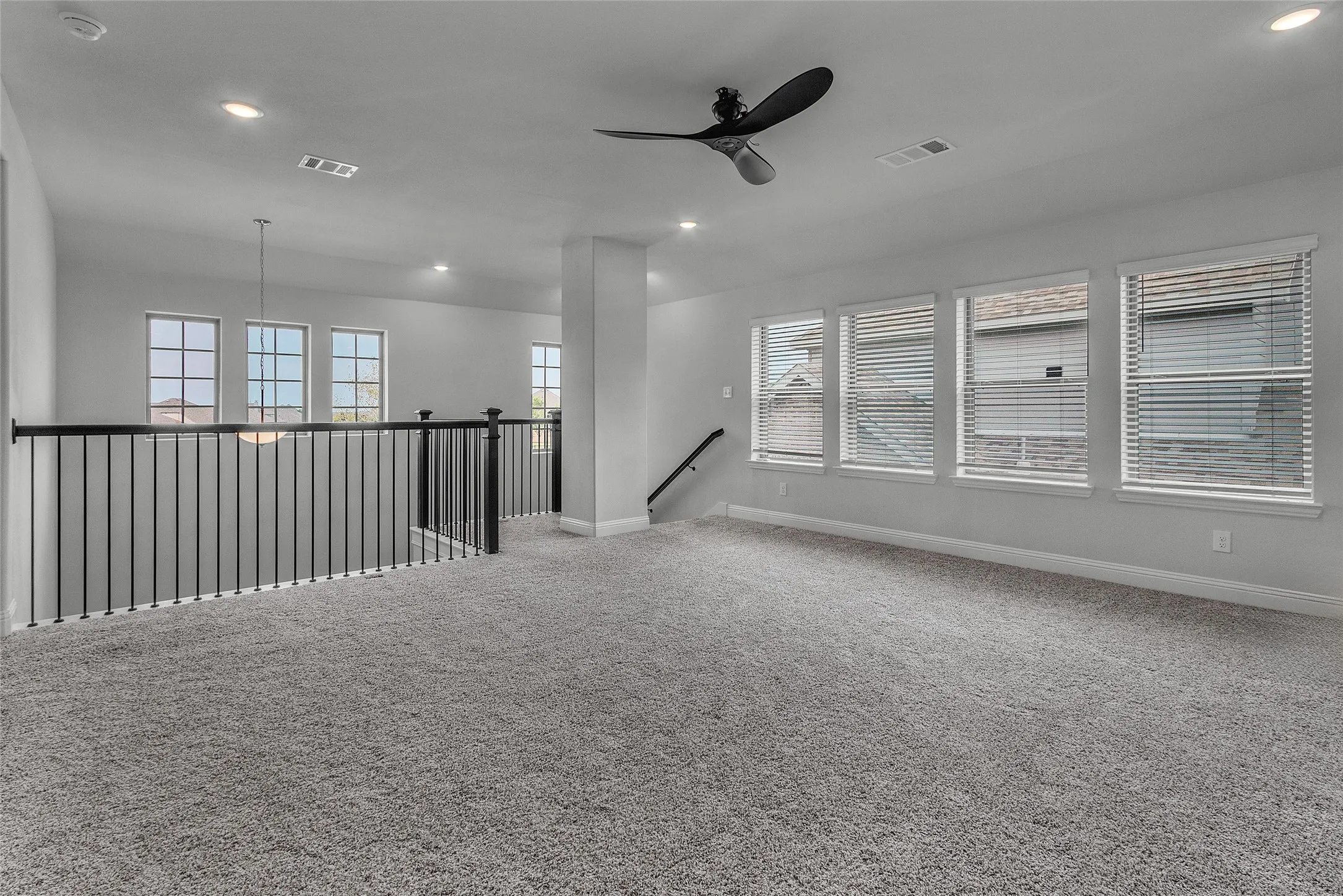Empty room with carpet floors