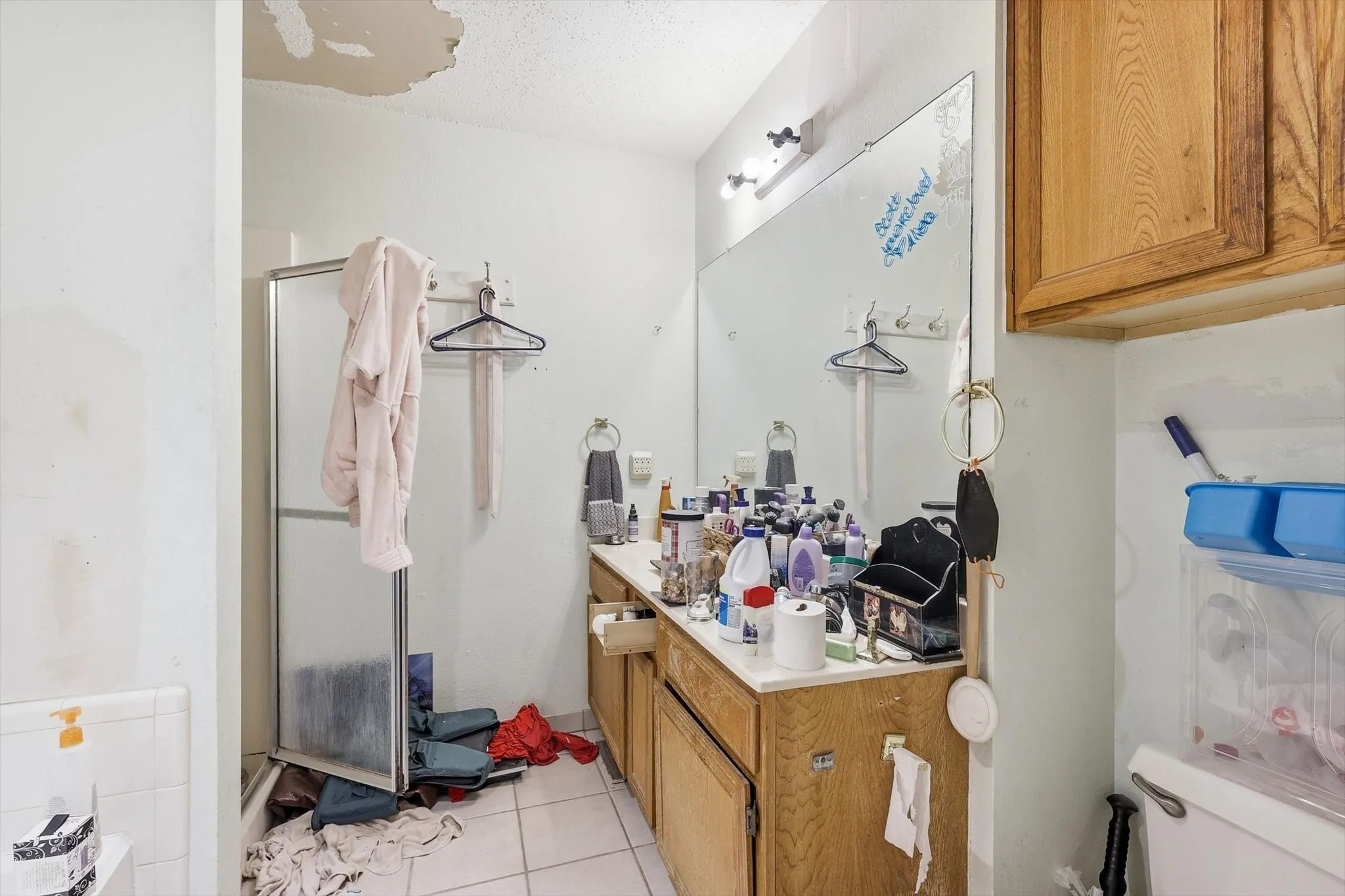 Primary bathroom with separate tub and shower