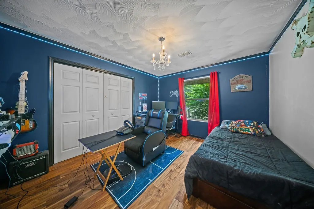 1st floor bedroom just past the kitchen and entry areas