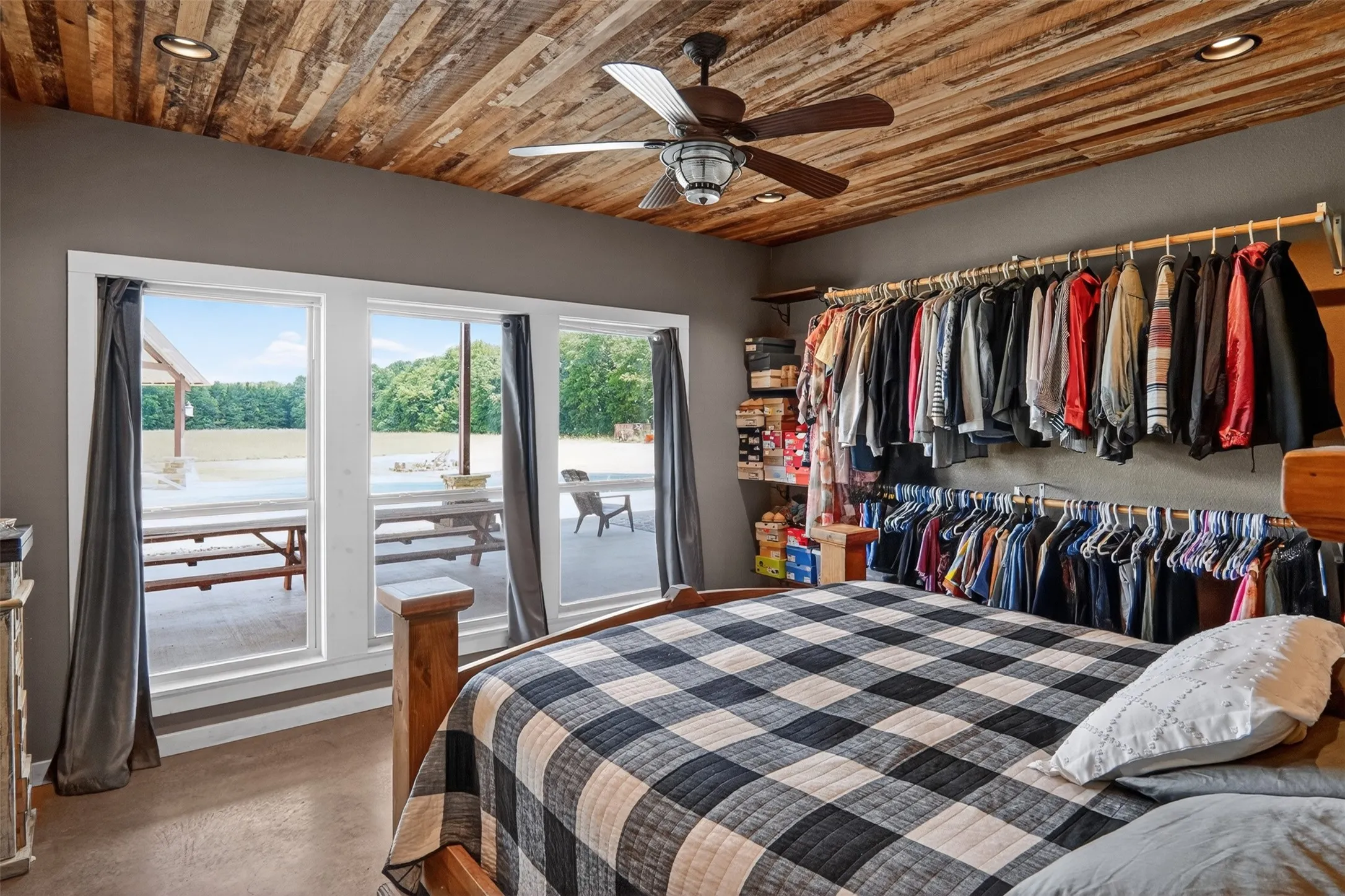 1st floor bedroom featuring a wood-finish plank ceiling, a ceiling fan with integrated lighting, and recessed lighting