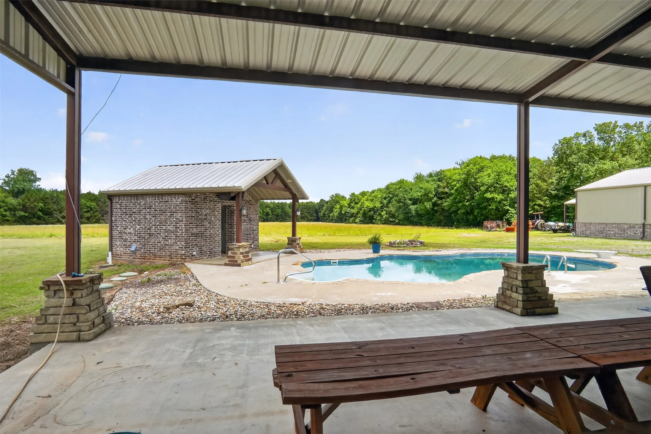 20x23 back Covered patio with concrete flooring