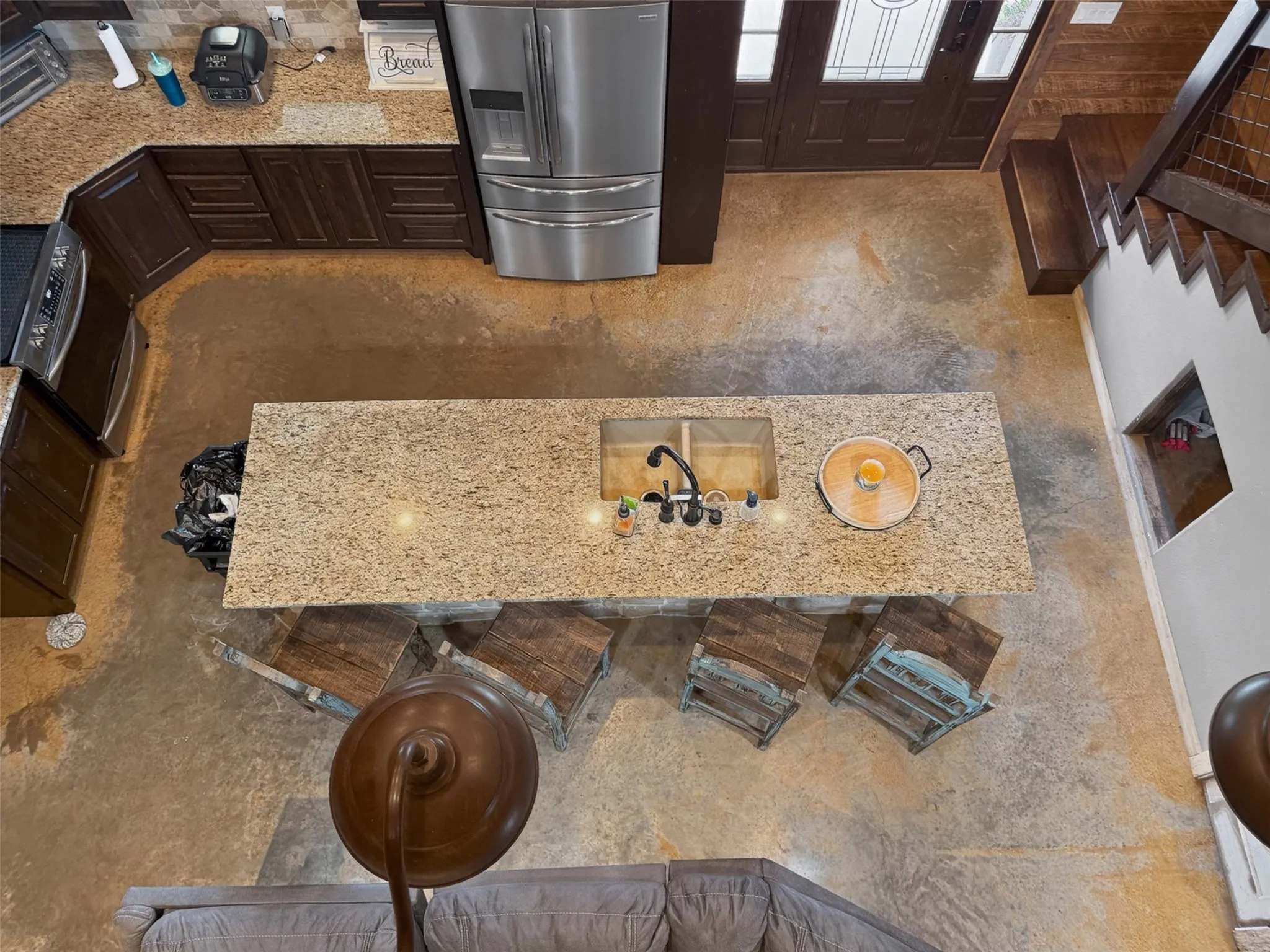 over looking the kitchen from the @ upstairs loft area