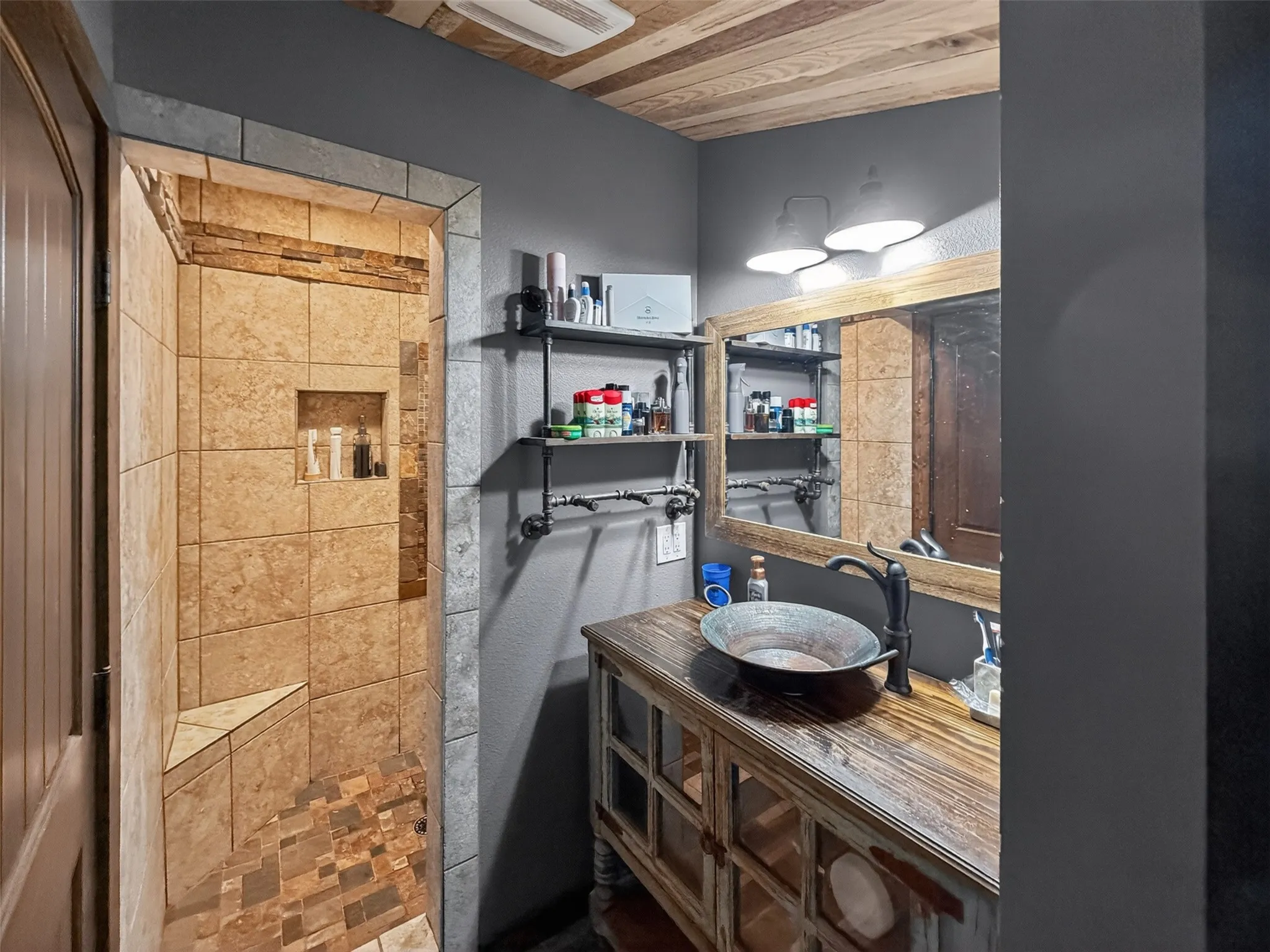 2nd bathroom upstairs rustic-inspired bathroom featuring a walk-in shower with tiled walls and a built-in bench