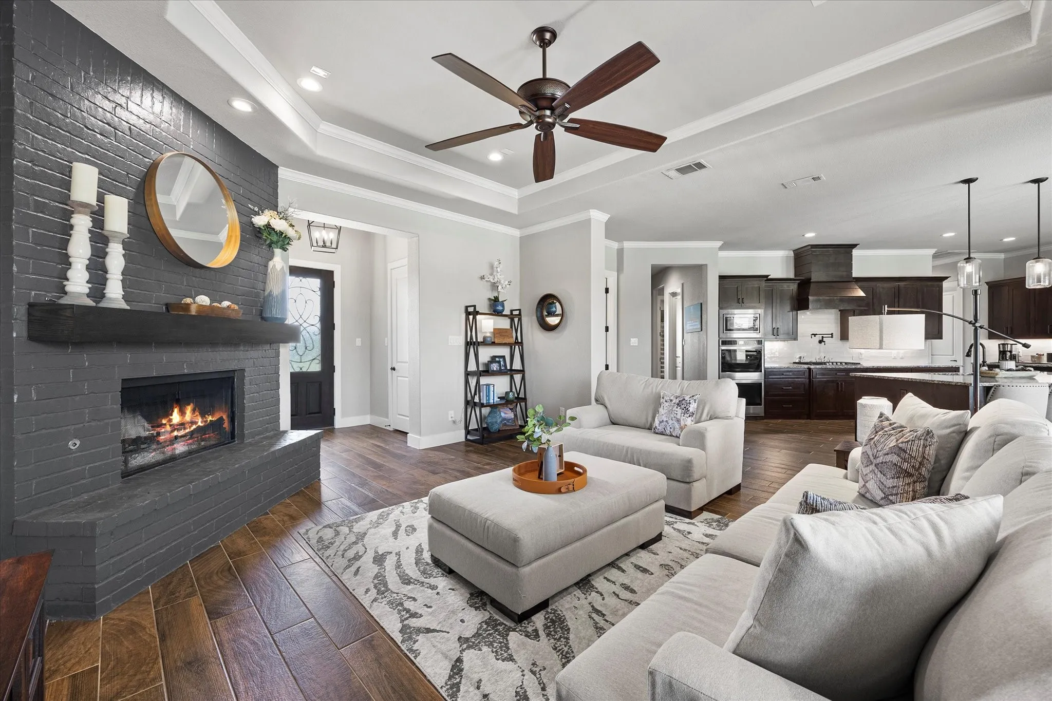 Gorgeous fireplace adds to this family room's charm!