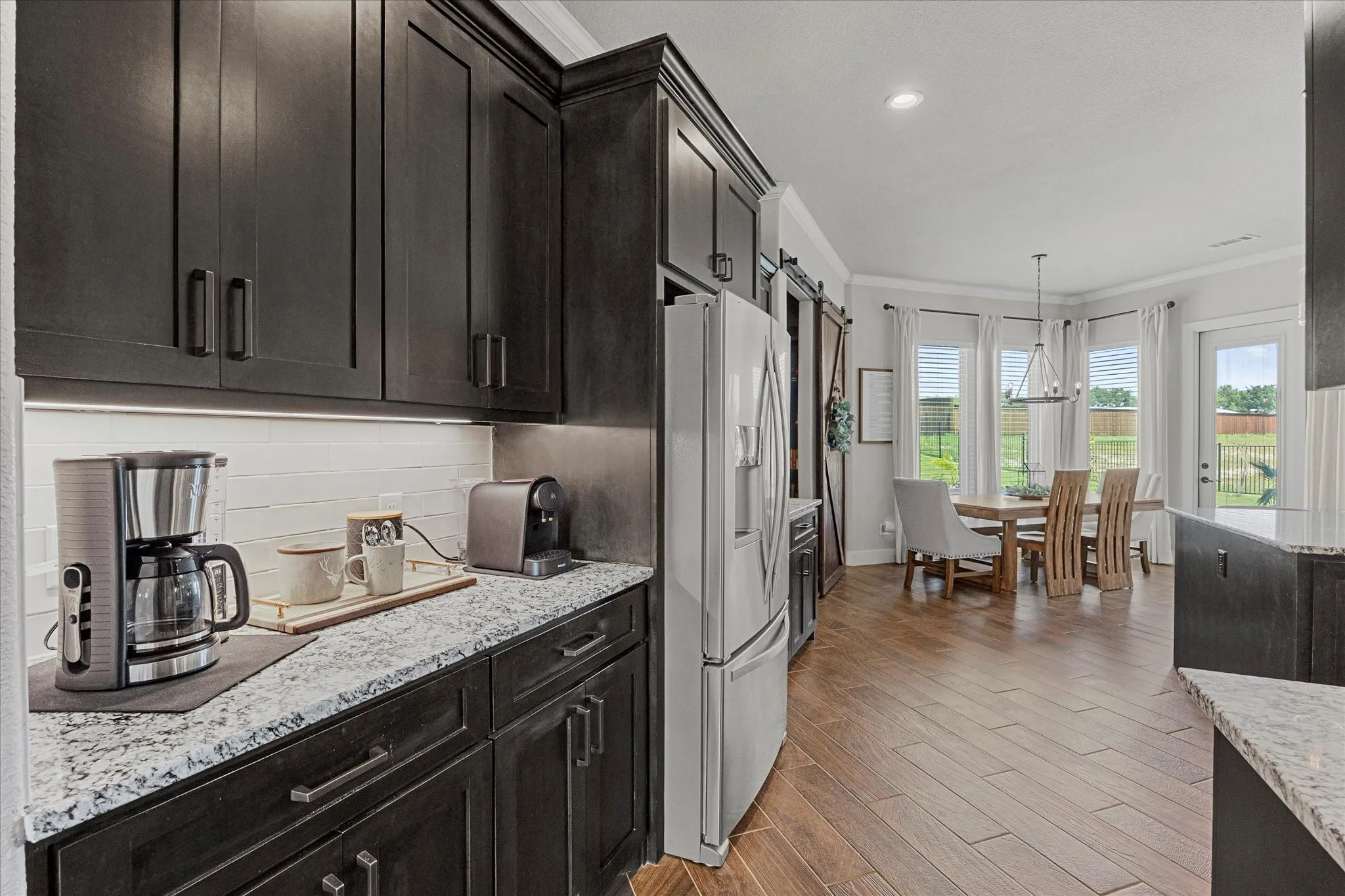 Tons of custom cabinets provide ample storage for your kitchen's necessities!