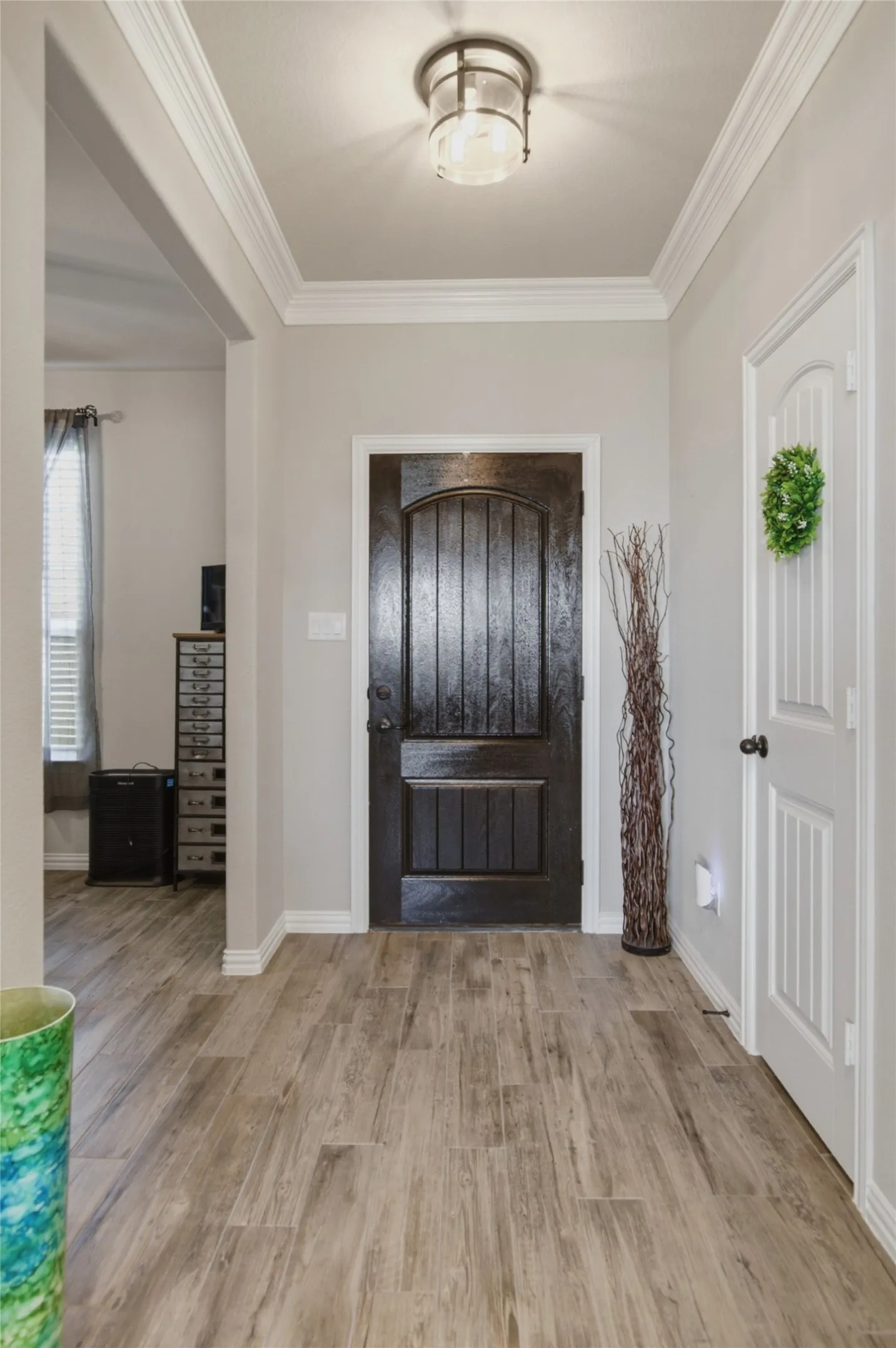 Stacked crown molding in the entry
