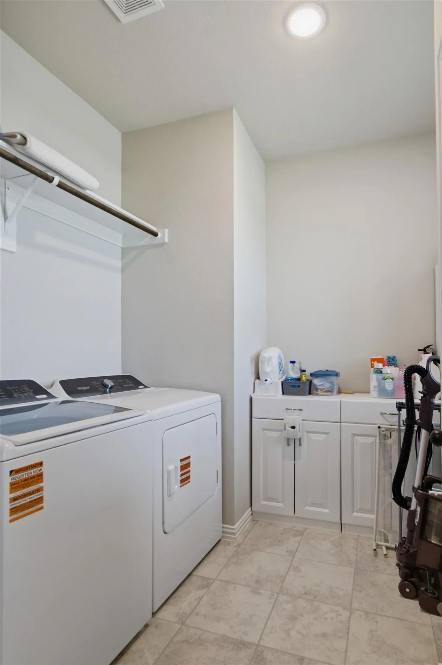 Large laundry room with lots of space for extra storage