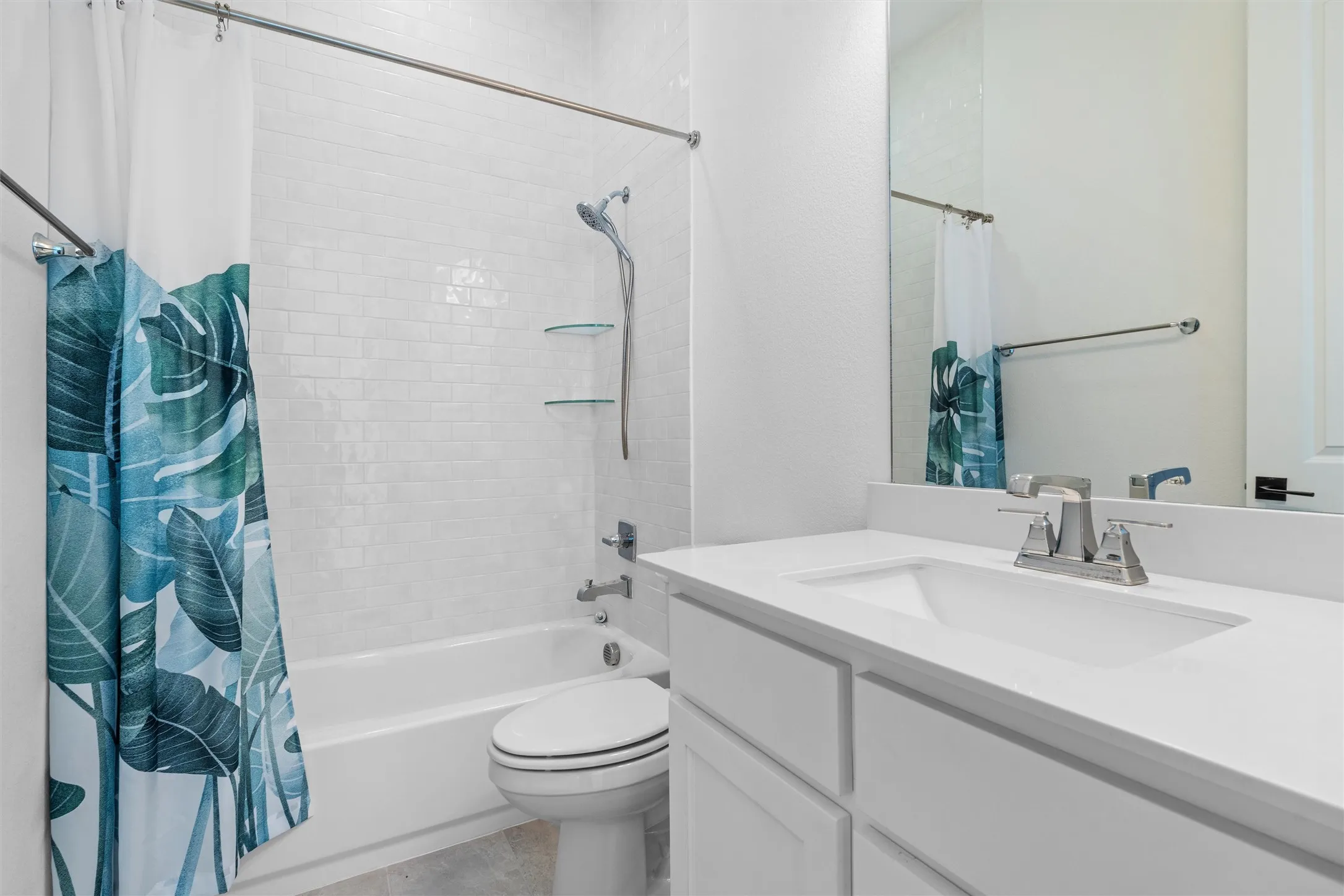 Fresh, bright, and functional, this full bathroom features a tub-and-shower combination, generous vanity space, and crisp finishes that keep the space feeling polished and practical.