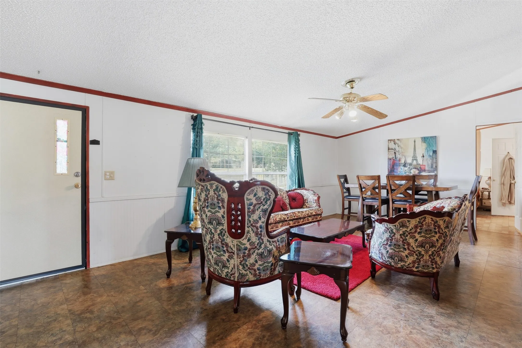 Large living room with tons a natural light.
