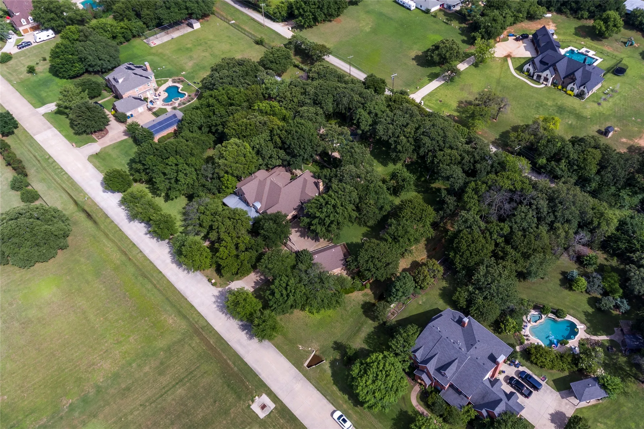 This incredible home offers a serene setting with all of the conveniences of the bustling metroplex. Such a remarkable find!