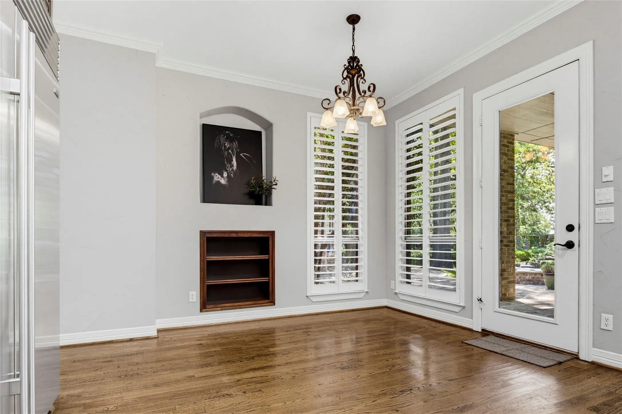 A doorway off of this breakfast room leads to the covered back patio.