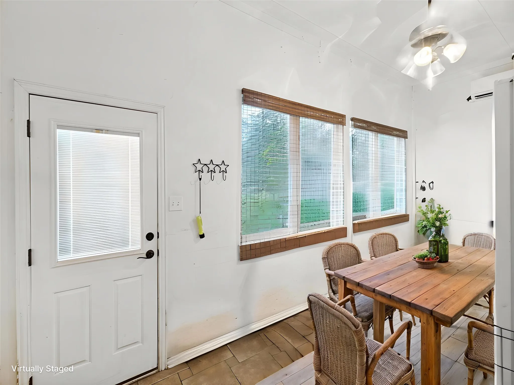 Virtually Staged - Sun Room with dedicated a/c