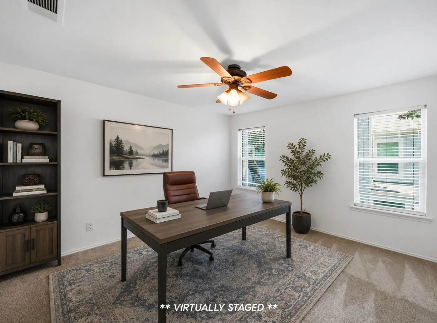 Bright room featuring carpeted flooring and white walls