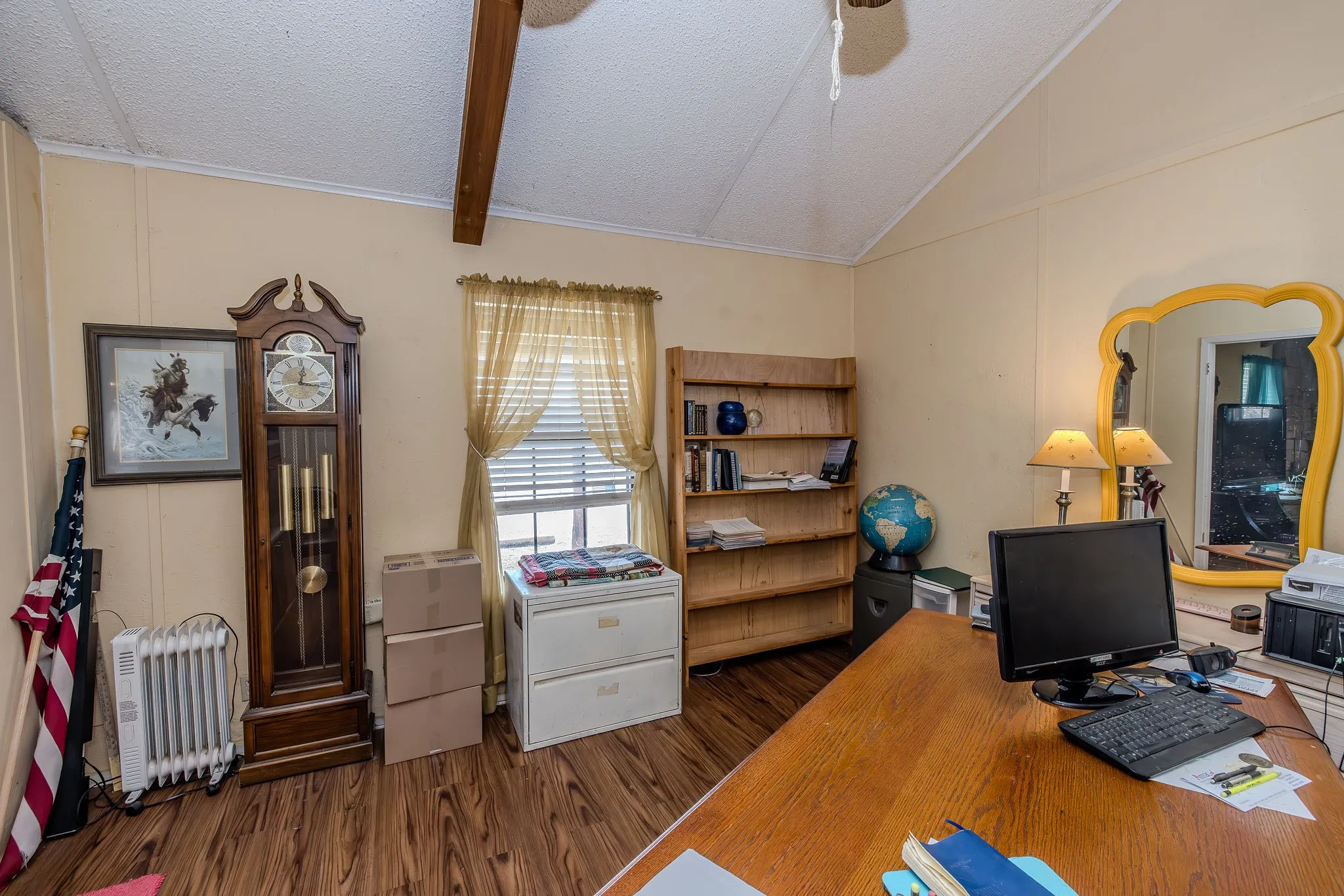 This wall with the window is the front porch wall (faces FM 2353).