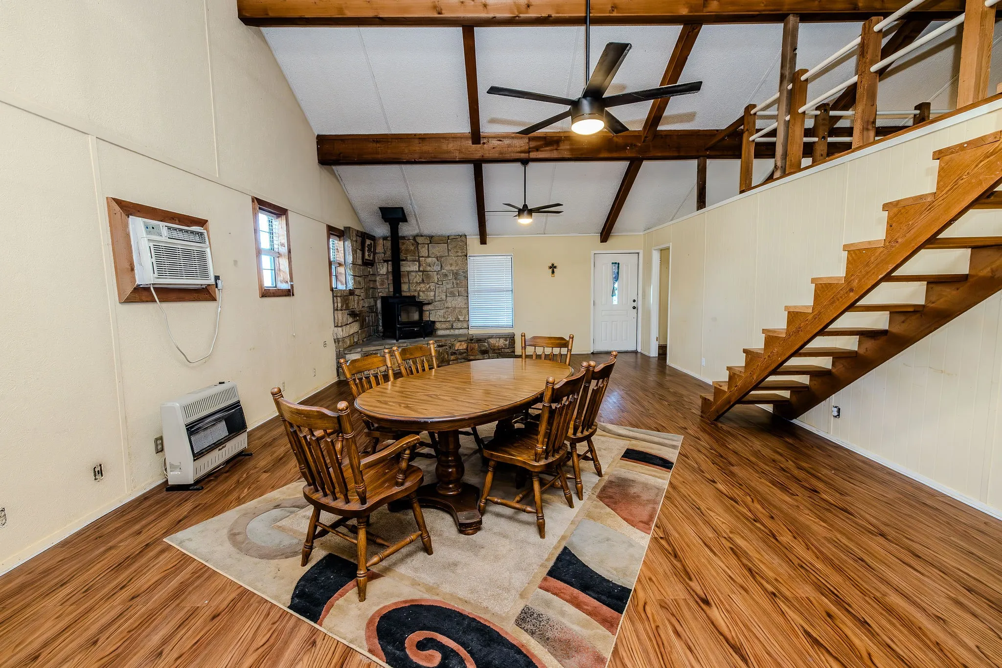 View of dining & living area - upper loft and office to the right.